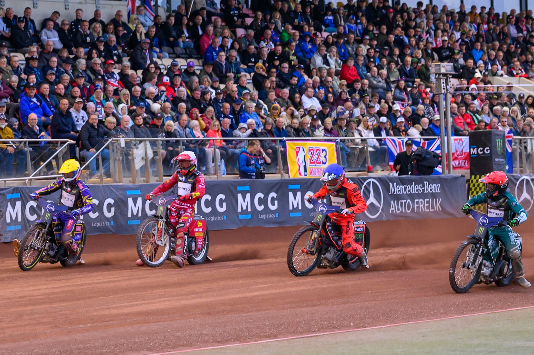 (L to R) Kacper Woryna (223) of Poland in Yellow, Max Fricke (46) of Australia in White, Jan Kvech (201) of Czech Republic in Blue and Leon Madsen (30) of Denmark in Red during the ATPI  FIM Speedway GP of Manchester at the National Speedway Stadium, Manchester on Friday 5th June 2026. (Photo: Ian Charles | MI News)
