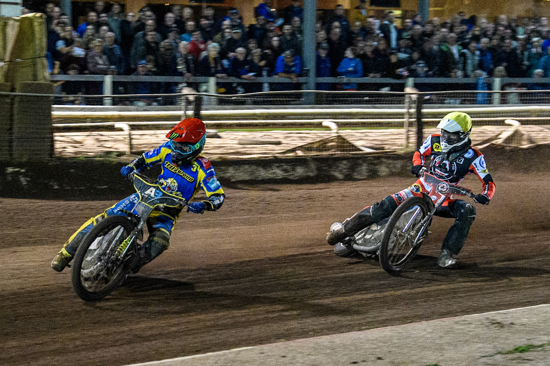 Sheffield Tigers' Chris Holder  in Red leading Belle Vue Aces' Antti Vuolas  in Yellow during the Rowe Motor Oil Premiership Play Off Semi Final 2nd leg between Sheffield Tigers and Belle Vue Aces at Owlerton Stadium, Sheffield on Thursday 19th September 2024. (Photo: Ian Charles | MI News)