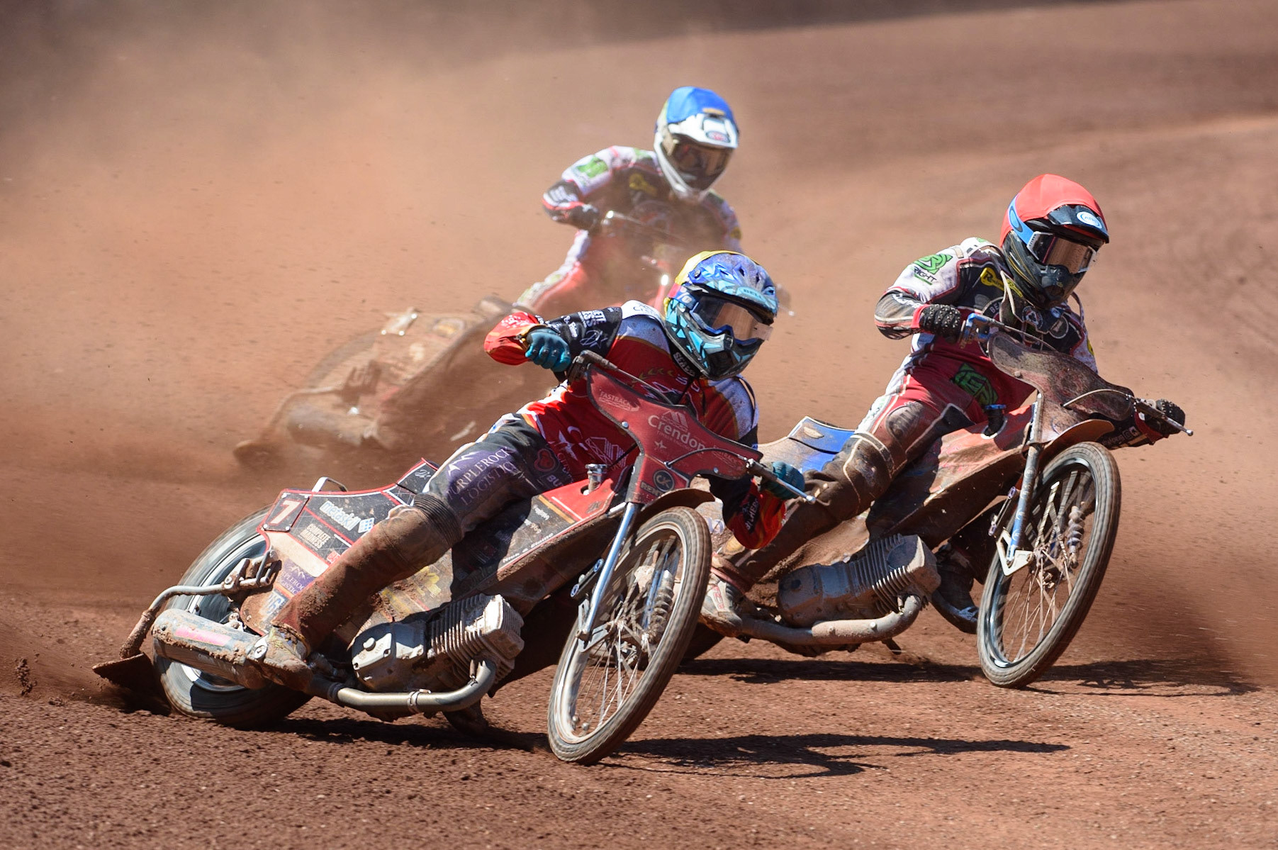 MANCHESTER, UK. MAY 31ST  Ulrich Ostergaard  (Yellow) outside Brady Kurtz  (Red) and Richie Worrall  (Blue) during the SGB Premiership match between Belle Vue Aces and Peterborough at the National Speedway Stadium, Manchester on Monday 31st May 2021. (Credit: Ian Charles | MI News)