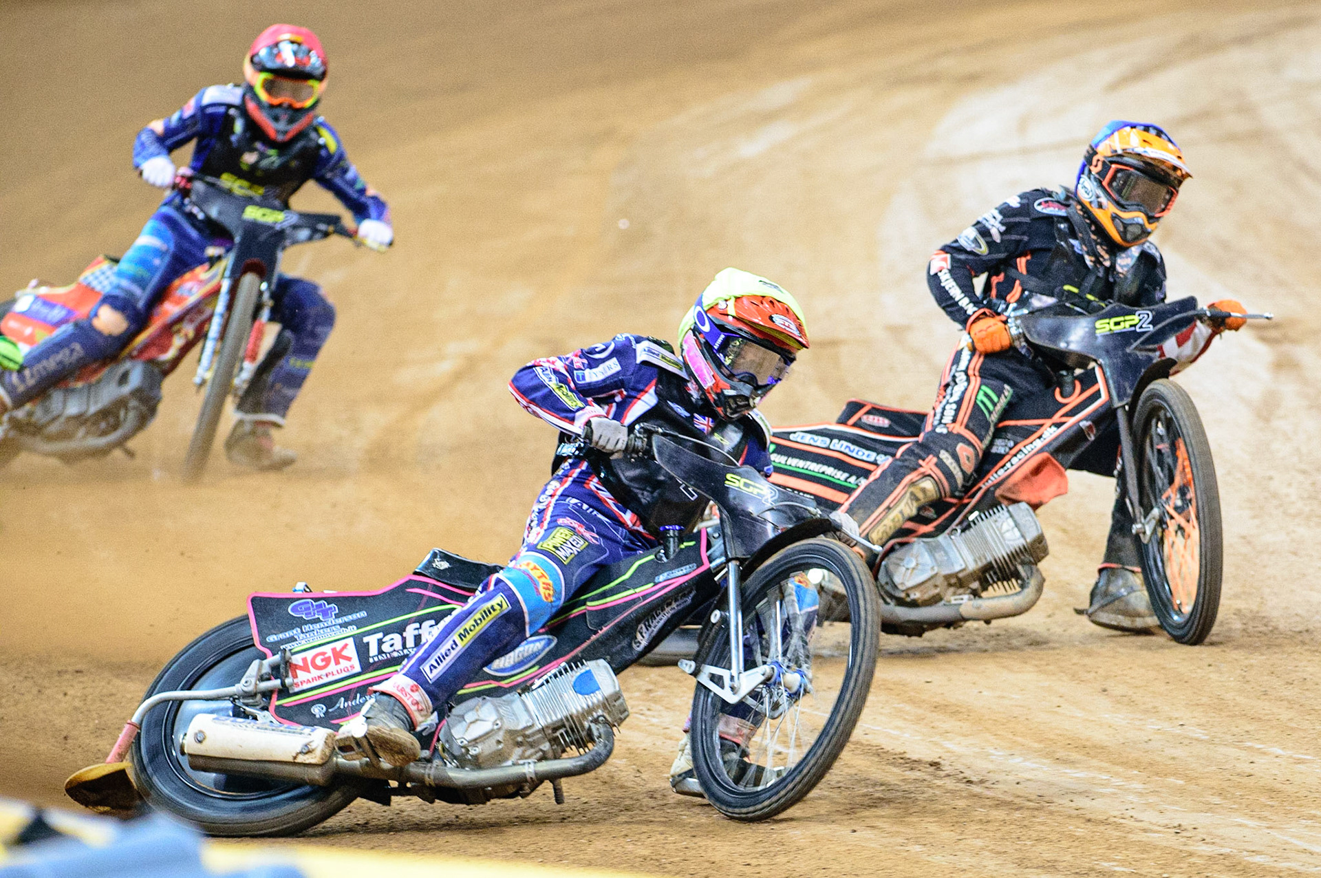 Leon Flint (Great Britain)  (Yellow) outside Kevin Juhl Pedersen (Denmark)  (Blue) with Drew Kemp (Great Britain)  (Red) behind during the FIM  Speedway Grand Prix  2 of Great Britain at the Principality Stadium, Cardiff on Sunday 14th August 2022. (Credit: Ian Charles | MI News)