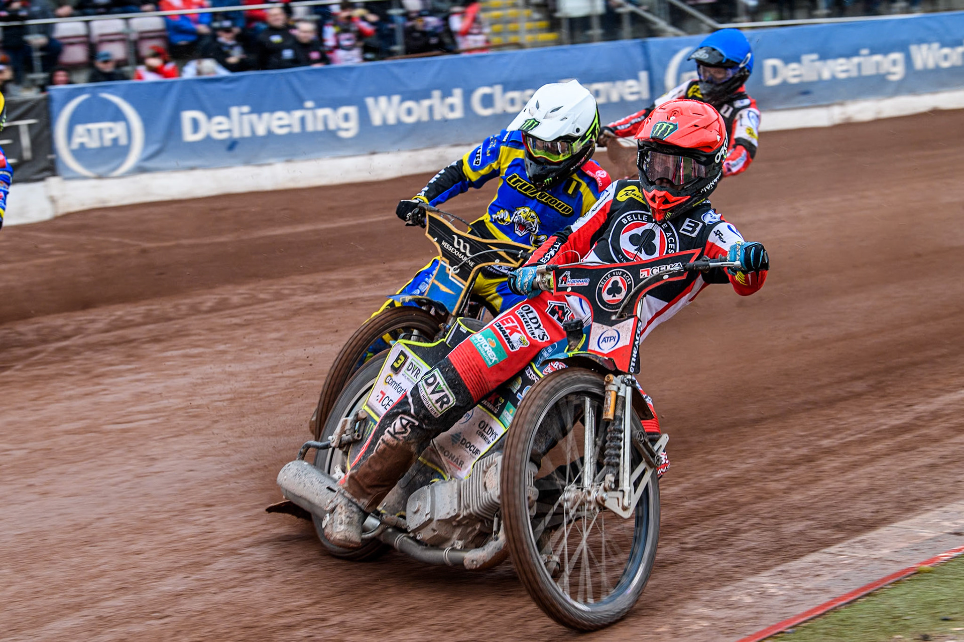 Belle Vue ATPI Aces Brady Kurtz (Red) leads  Sheffield Tigers' Jack Holder (White) and Belle Vue ATPI Aces Jaimon Lidsey (Blue) during the Rowe Motor Oil Premiership KO Cup Quarter Final 1st Leg between Belle Vue Aces and Sheffield Tigers at the National Speedway Stadium, Manchester on Monday 1st April 2024. (Photo: Ian Charles | MI News)