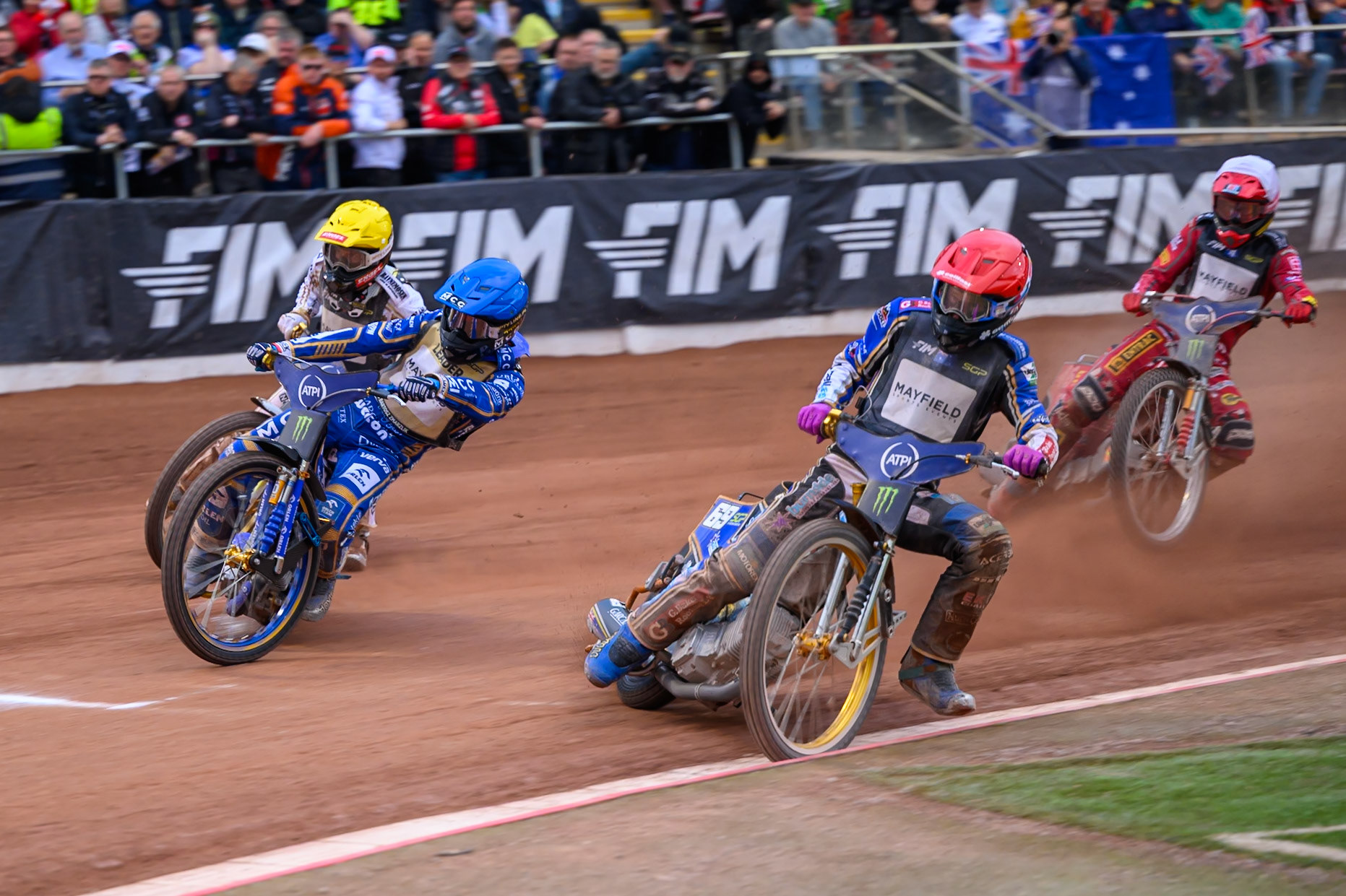Jason Doyle (69) of Australia in Red leading Bartosz Zmarzlik (95) of Poland in Blue Anders Thomsen (105) of Denmark in Yellow and Max Fricke (46) of Australia in White during the ATPI  FIM Speedway GP of Manchester at the National Speedway Stadium, Manchester on Saturday 6th June 2026. (Photo: Ian Charles | MI News)