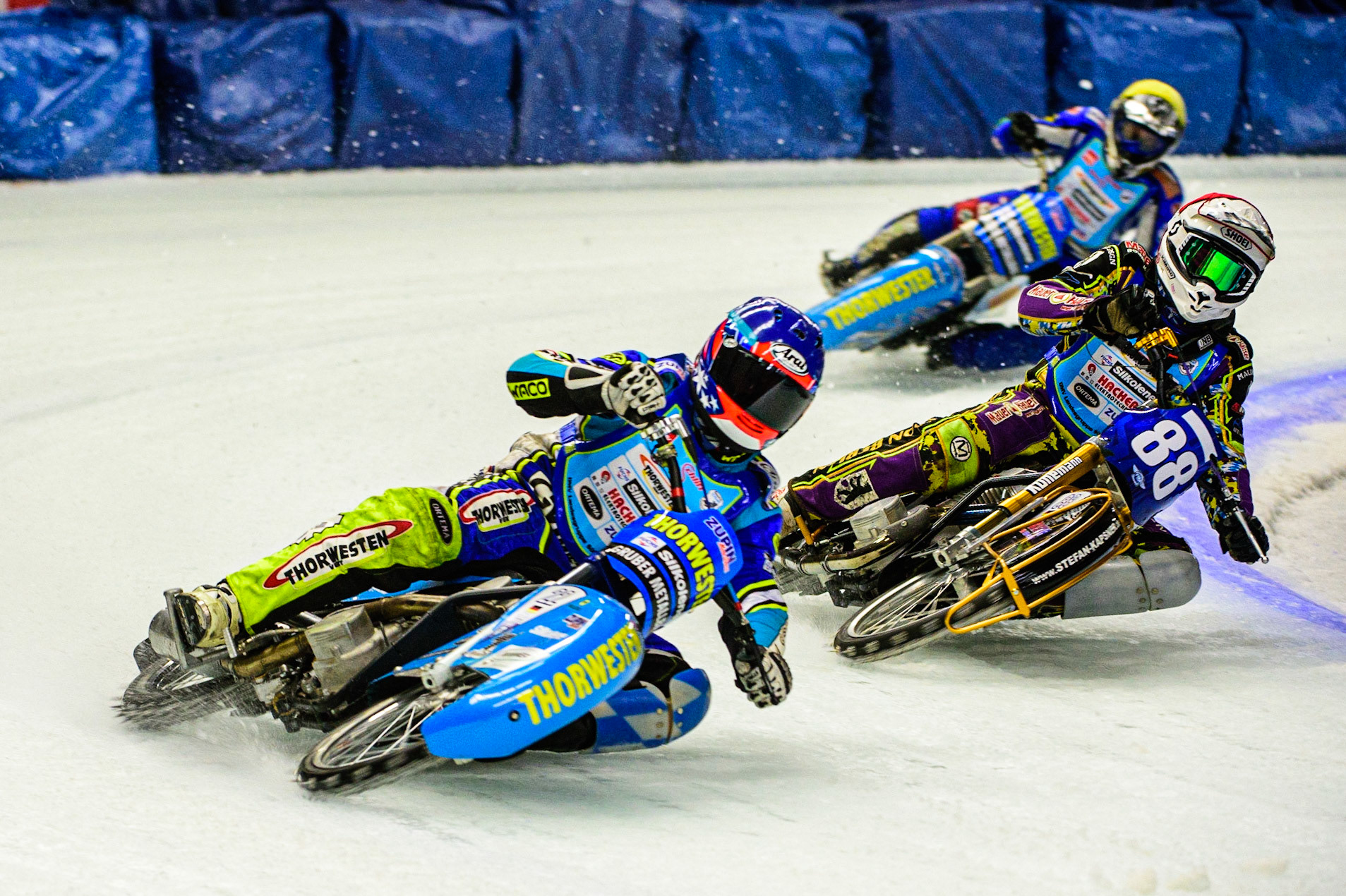 Günther Bauer (Blue) leads Max Niedermaier (Red) ahead of Martin Leitner (Yellow) during the Race of Legends at the Max-Aicher-Arena, Inzell on Friday 17th March 2023. (Photo: Ian Charles | MI News)