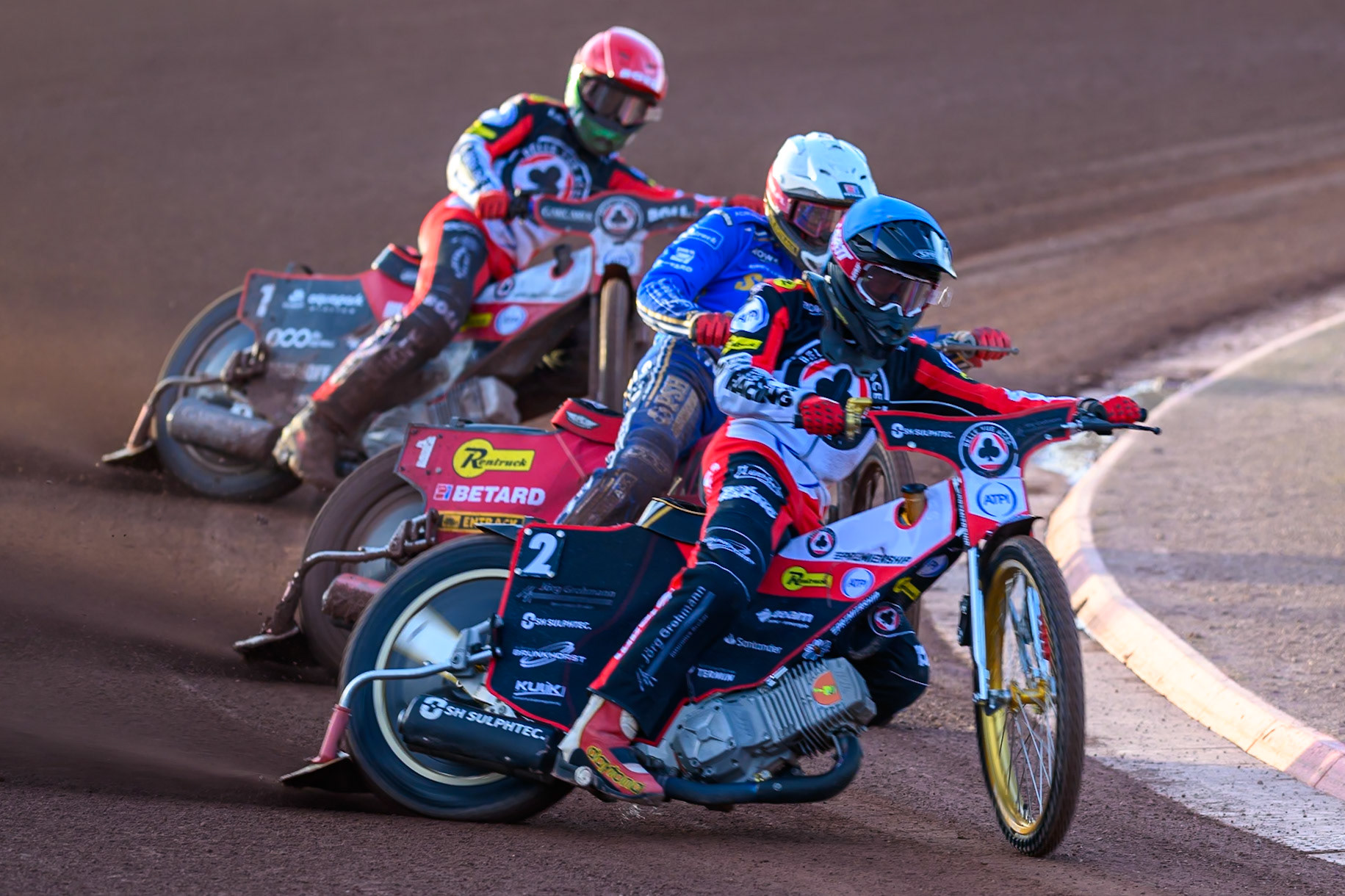 Norick Blödorn of Belle Vue Aces in Blue leading Max Fricke of Kings Lynn Stars in White \and Brady Kurtz of Belle Vue Aces in Red during the Rowe Motor Oil Premiership match between Belle Vue Aces and King's Lynn Stars at the National Speedway Stadium, Manchester on Monday 10th August 2026. (Photo: Ian Charles | MI News)
