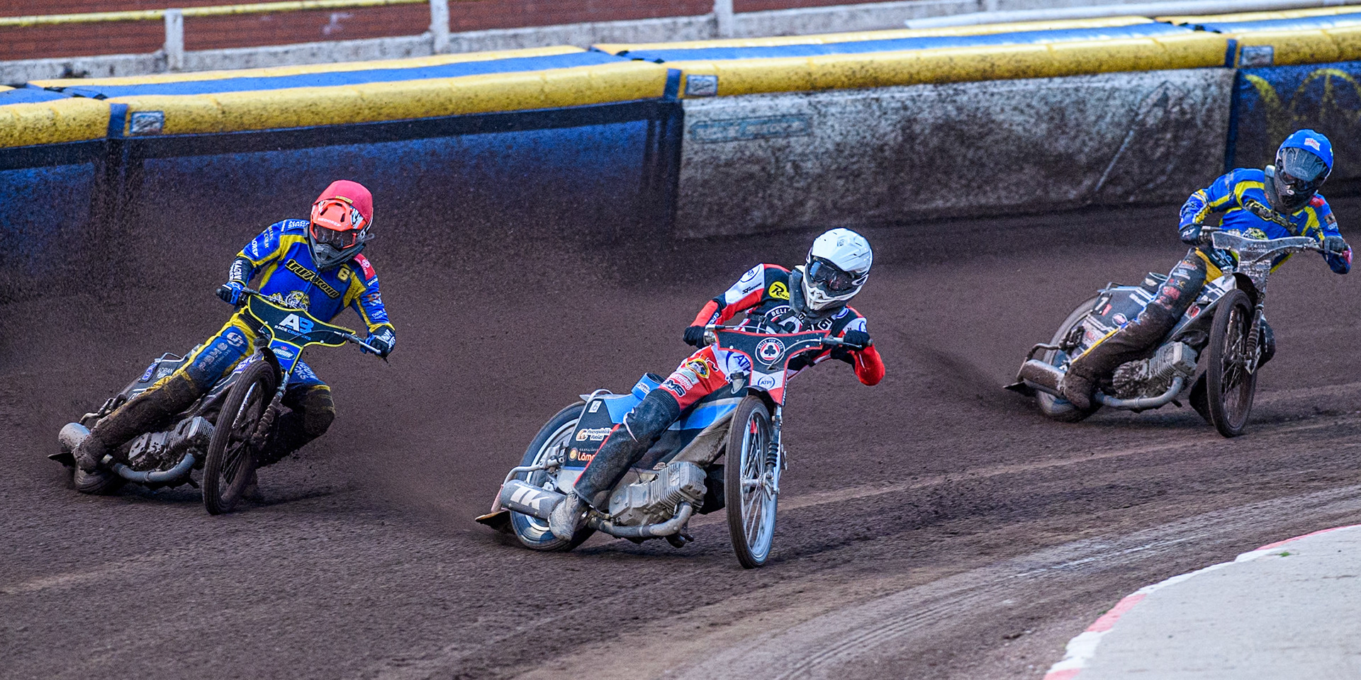 Belle Vue Aces' Antti Vuolas  in White leading Sheffield Tigers' Jason Edwards  in Red and Sheffield Tigers' Guest Rider Joe Thompson  in Blue during the Rowe Motor Oil Premiership match between Sheffield Tigers and Belle Vue Aces at Owlerton Stadium, Sheffield on Monday 26th August 2024. (Photo: Ian Charles | MI News)