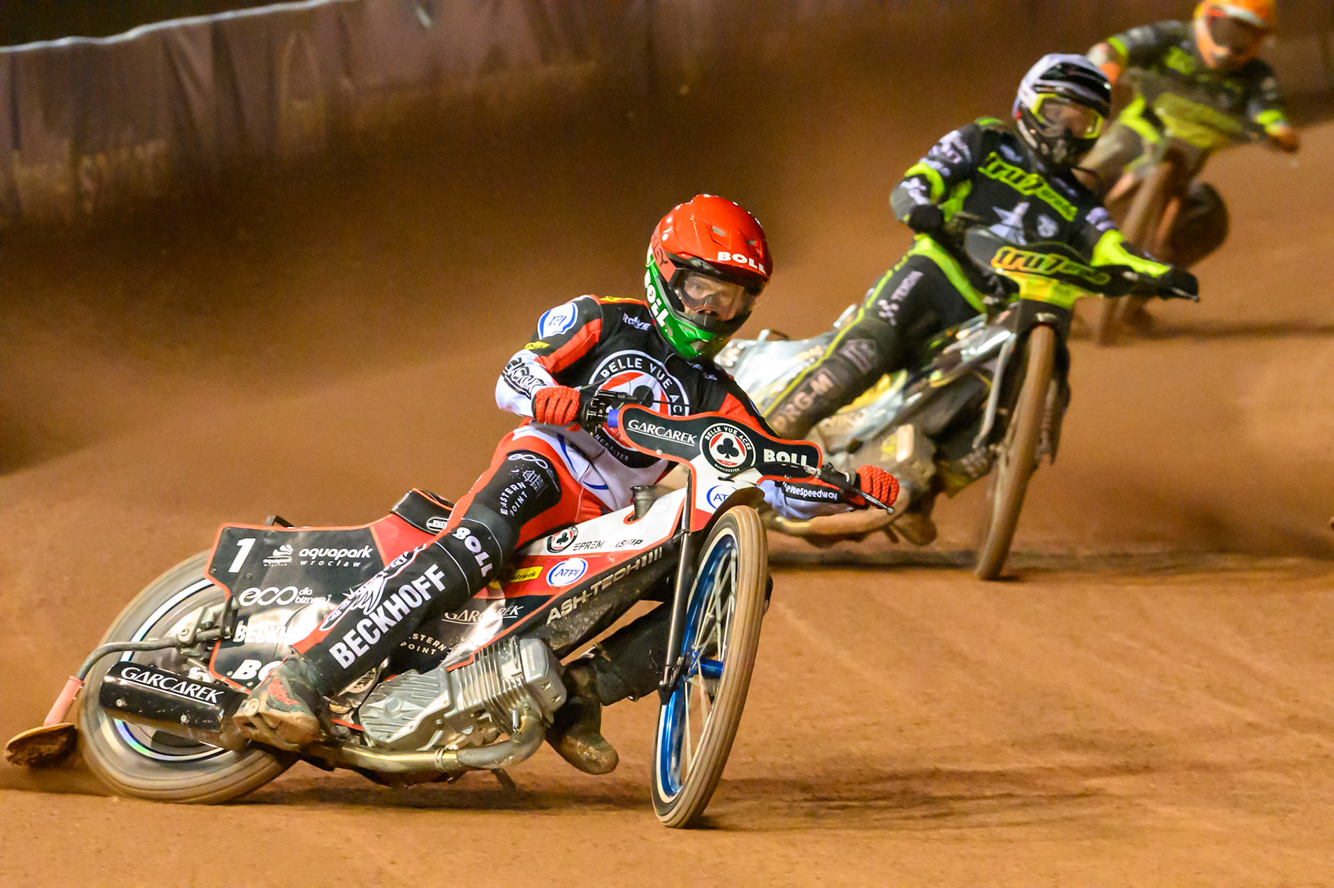Brady Kurtz of Belle Vue Aces in Red leading Tobias Musielak of Ipswich Witches in White and Kevin Juul Pedersen of Ipswich Witches in Yellow during the Rowe Motor Oil Premiership Play Off Semi Final 2nd leg match between Belle Vue Aces and Ipswich Witches at the National Speedway Stadium, Manchester on Monday 28th September 2026. (Photo: Ian Charles | MI News)