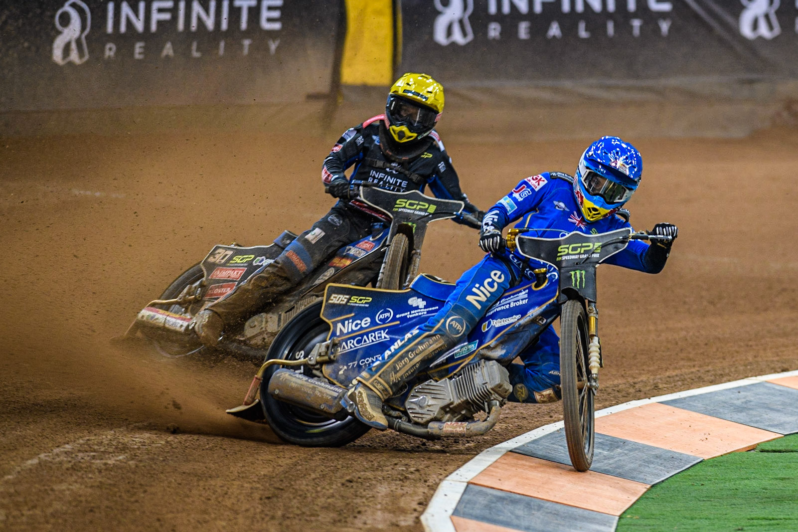 Robert Lambert (505) (Blue) leads  Leon Madsen (30) (Yellow) during the FIM Speedway Grand Prix of Great Britain at the Principality Stadium, Cardiff on Saturday 2nd September 2023. (Photo: Ian Charles | MI News)