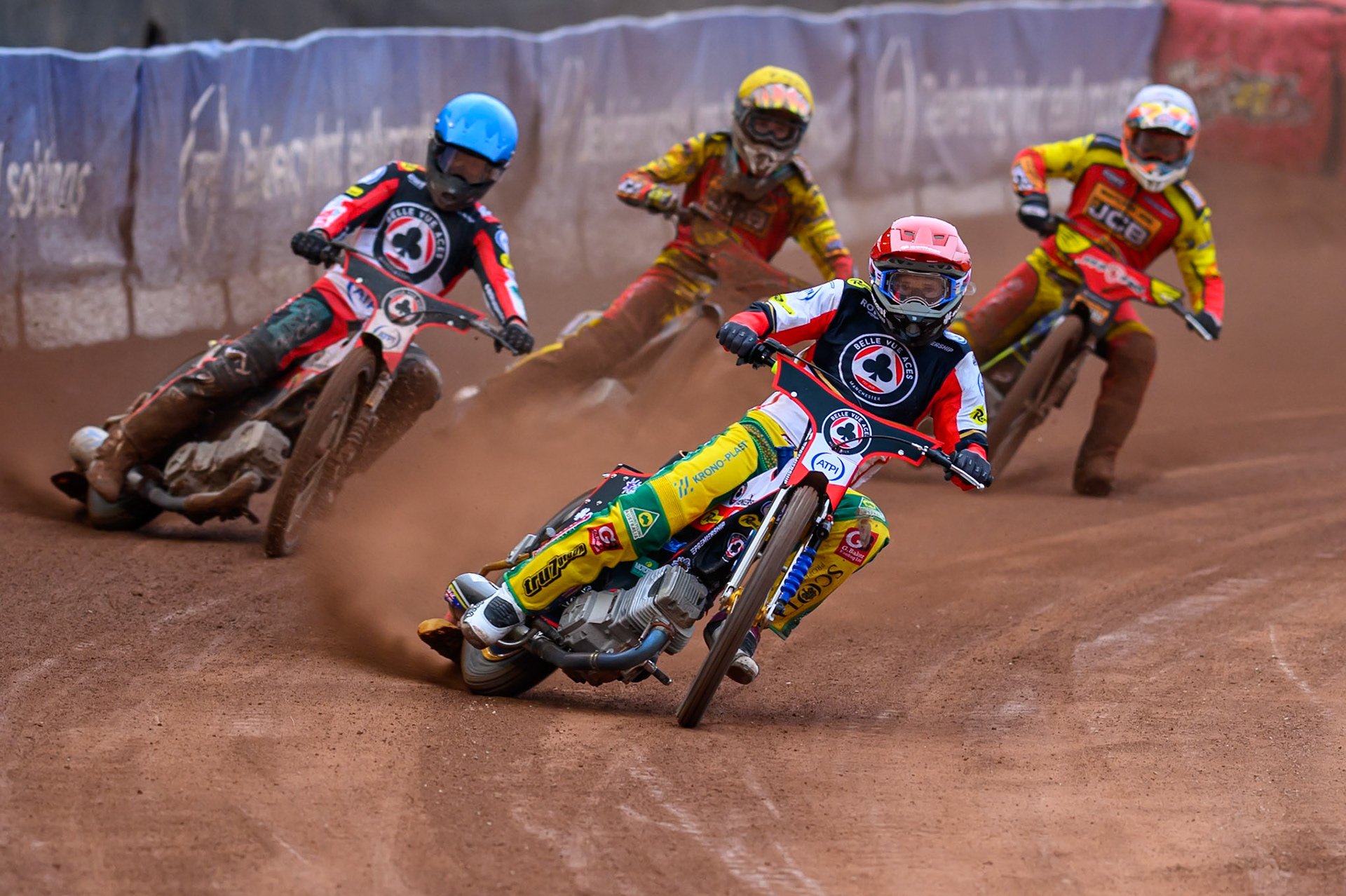 Jason Doyle of Belle Vue Aces in Red leading Tate Zischke of Belle Vue Aces in Blue Drew Kemp of Leicester Lions in Yellow and Nick Morris of Leicester Lions in White during the Rowe Motor Oil Premiership match between Belle Vue Aces and Leicester Lions at the National Speedway Stadium, Manchester on Monday 15th June 2026. (Photo: Ian Charles | MI News)