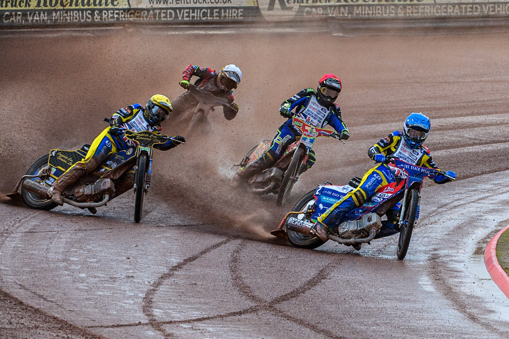 Adam Ellis (Blue) leads Kyle Howarth (Yellow), Simon Lambert (Red) and Danyon Hulme (White) in the opening heat during the Sports Insure British Speedway Final at the National Speedway Stadium, Manchester on Monday 14th August 2023. (Photo: Ian Charles | MI News)
