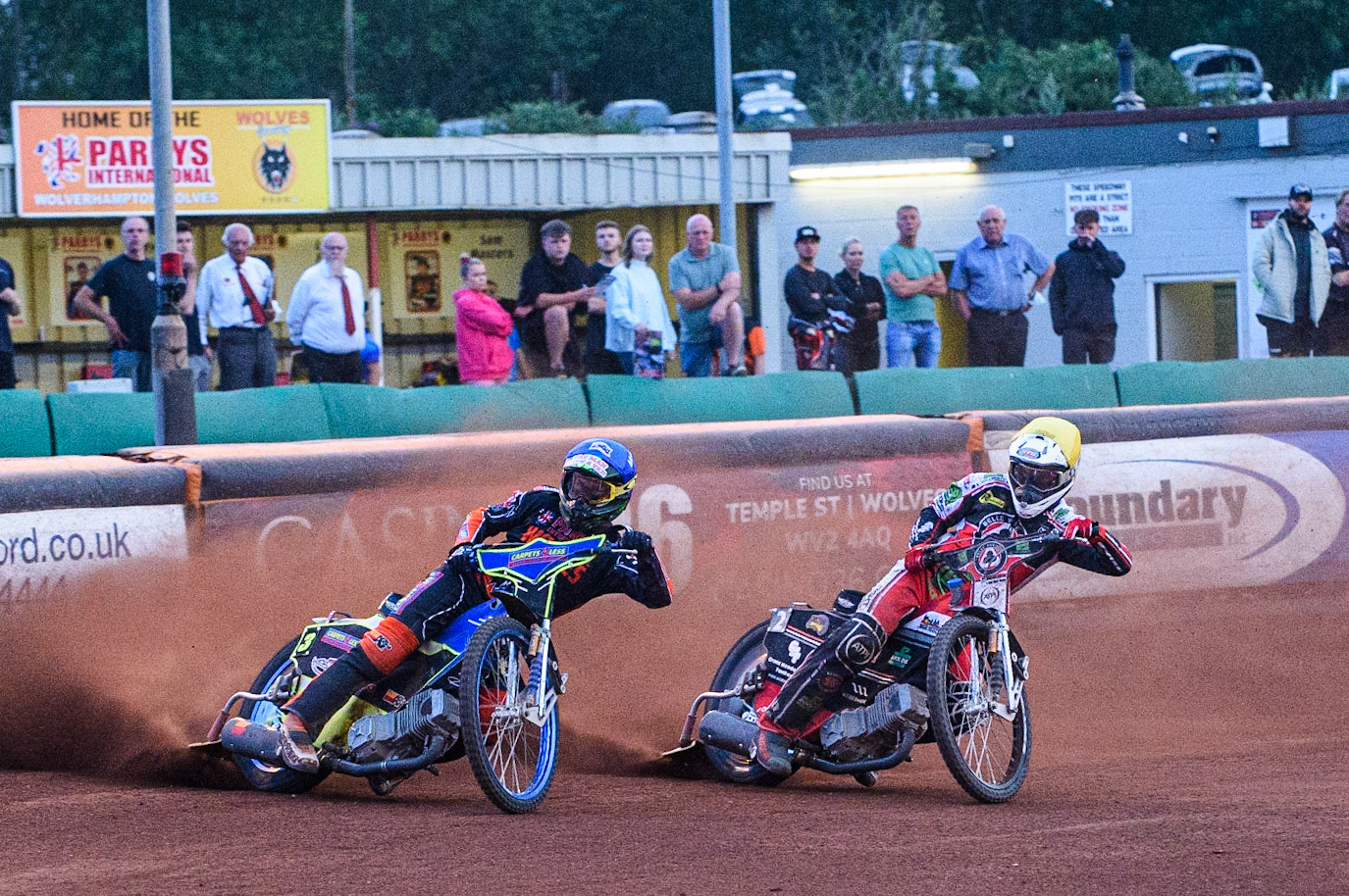 WOLVERHAMPTON, UK. JULY 26TH Nick Morris  (Blue) outside Richie Worrall  (Yellow) during the SGB Premiership match between Wolverhampton Wolves and Belle Vue Aces at the Ladbroke Stadium, Wolverhampton on Monday 26th July 2021. (Credit: Ian Charles | MI News)