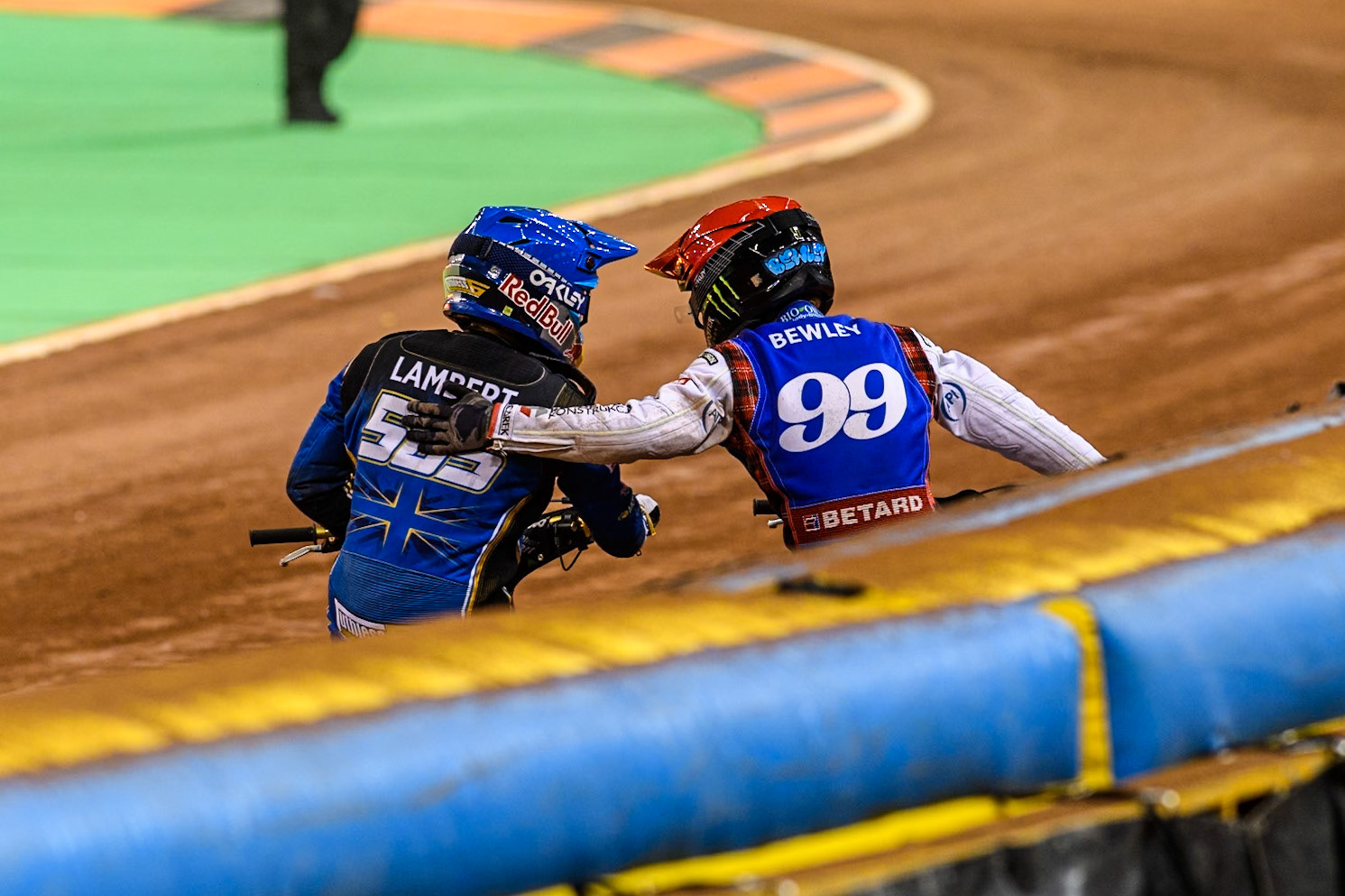 Daniel Bewley (99) of Great Britain in Red celebrates winning the Final with 2nd places Robert Lambert (505) of Great Britain in Blue during the FIM Speedway Grand Prix of Great Britain at The Principality Stadium, Cardiff on Saturday 17th August 2024. (Photo: Ian Charles | MI News)