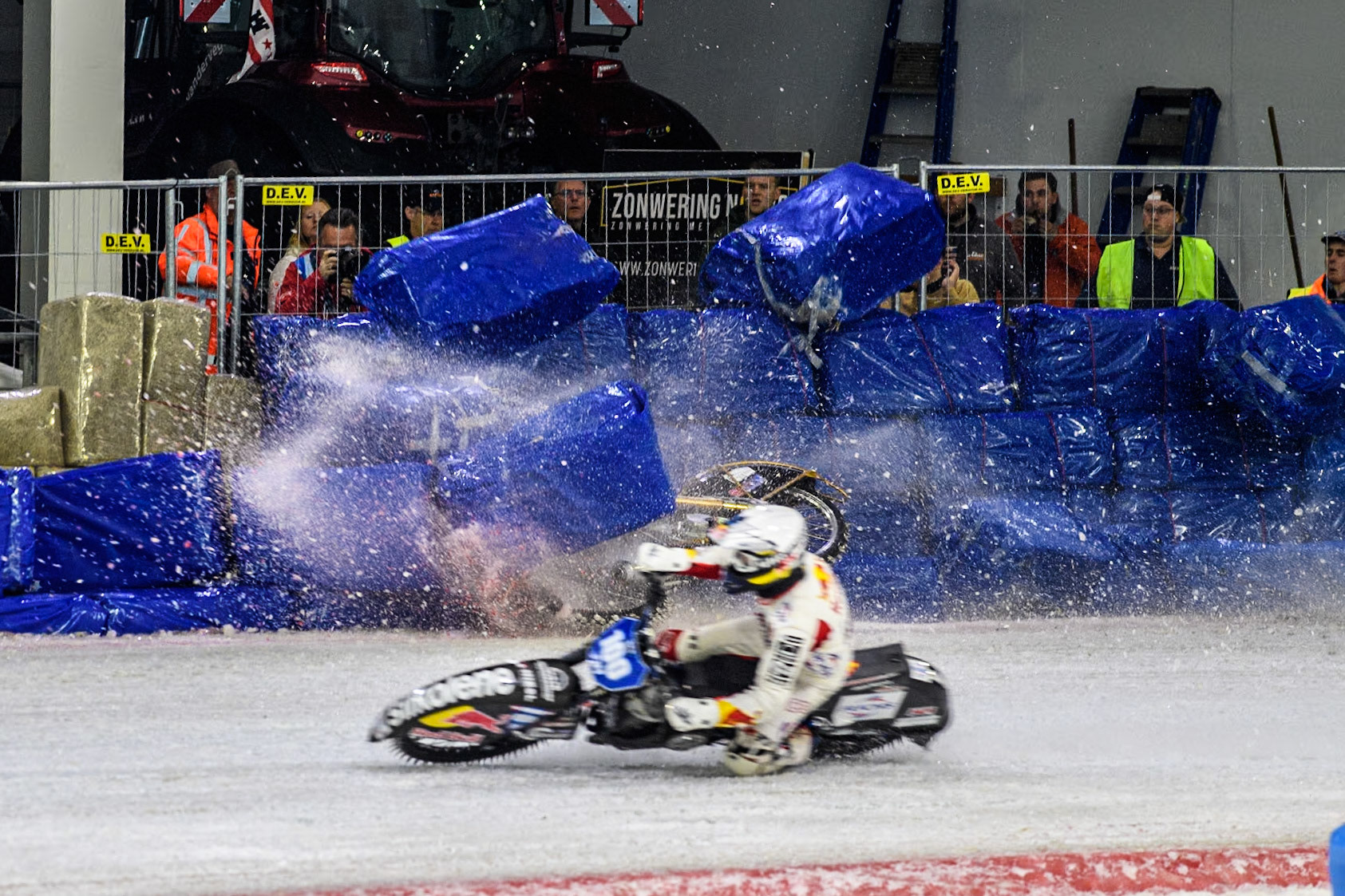 Germany's Max Niedermaier (88) crashes into the bales during the FIM Ice Speedway Gladiators World Championship Final 4 at Ice Rink Thialf, Heerenveen on Sunday 7th April 2024. (Photo: Ian Charles | MI News)