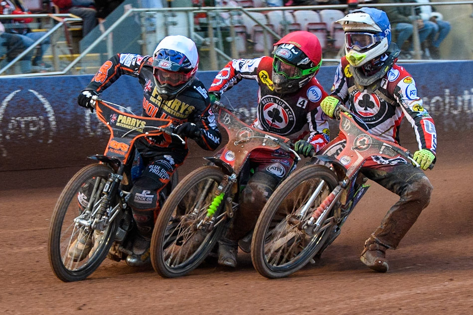 Steve Worrall (White), Charles Wright (Red) and Jake Mulford (Blue) hit the same point on the track during the Sports Insure Premiership Knock Out Cup Quarter Final 2nd Leg between Belle Vue Aces and Wolverhampton Wolves at the National Speedway Stadium, Manchester on Thursday 18th May 2023. (Photo: Ian Charles | MI News)