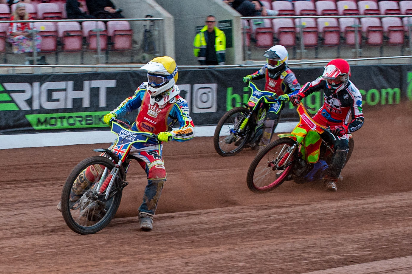 MANCHESTER, UK. JULY 2ND  Jake Mulford  (Yellow) leads Ben Woodhull   (Red) and Jacob Clouting  (White) during the National Development League match between Belle Vue Colts and Kent Royals at the National Speedway Stadium, Manchester on Friday 2nd July 2021. (Credit: Ian Charles | MI News)