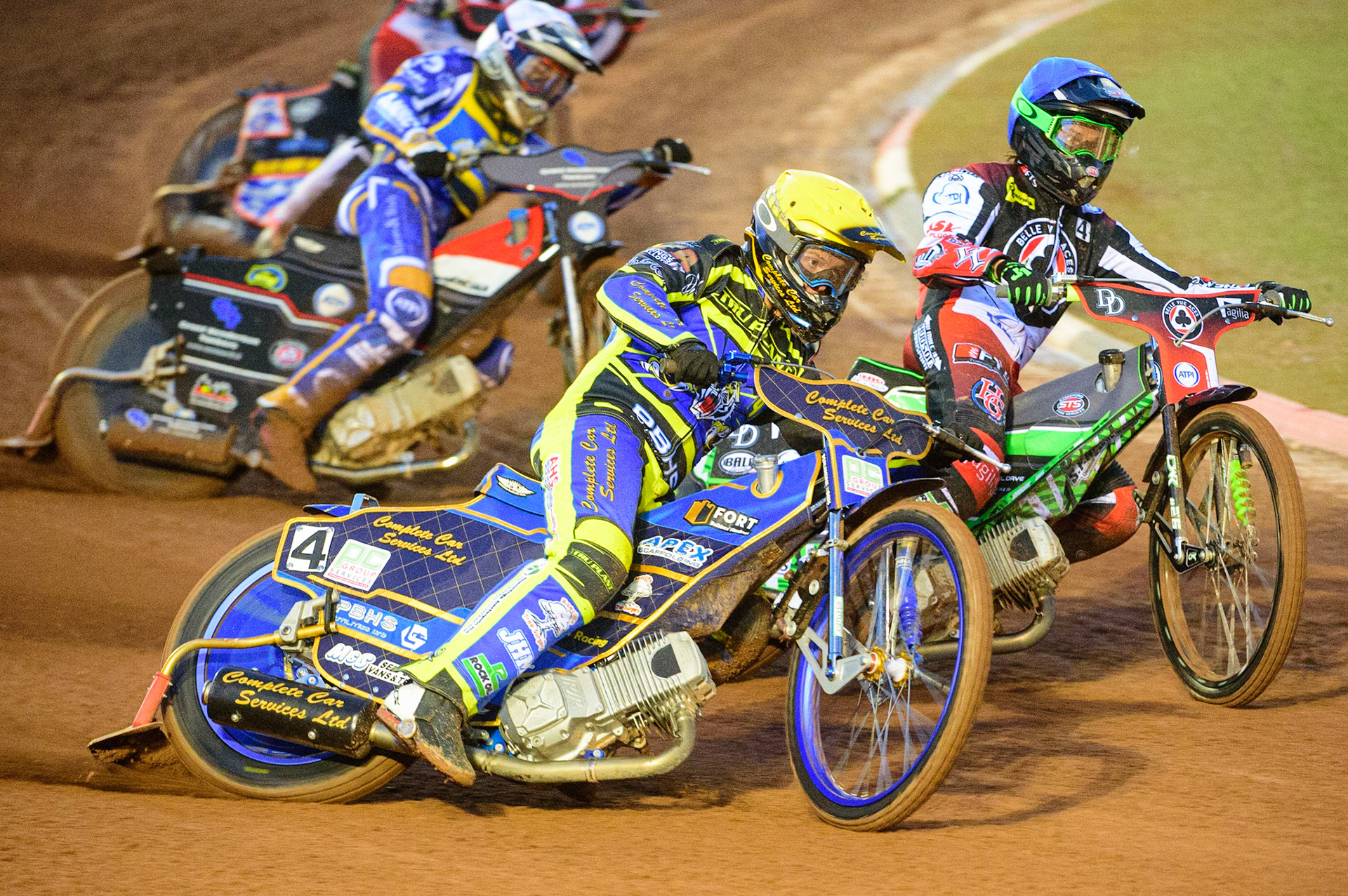 MANCHESTER, UK.  MAR 28TH.  Kyle Howarth of Sheffield  (Yellow) outside Charles Wright of Belle Vue  (Blue)  during the SGB Premiership League Cup match between Belle Vue Aces and Sheffield Tigers at the National Speedway Stadium, Manchester on Monday 28th March 2022. (Credit: Ian Charles | MI News)