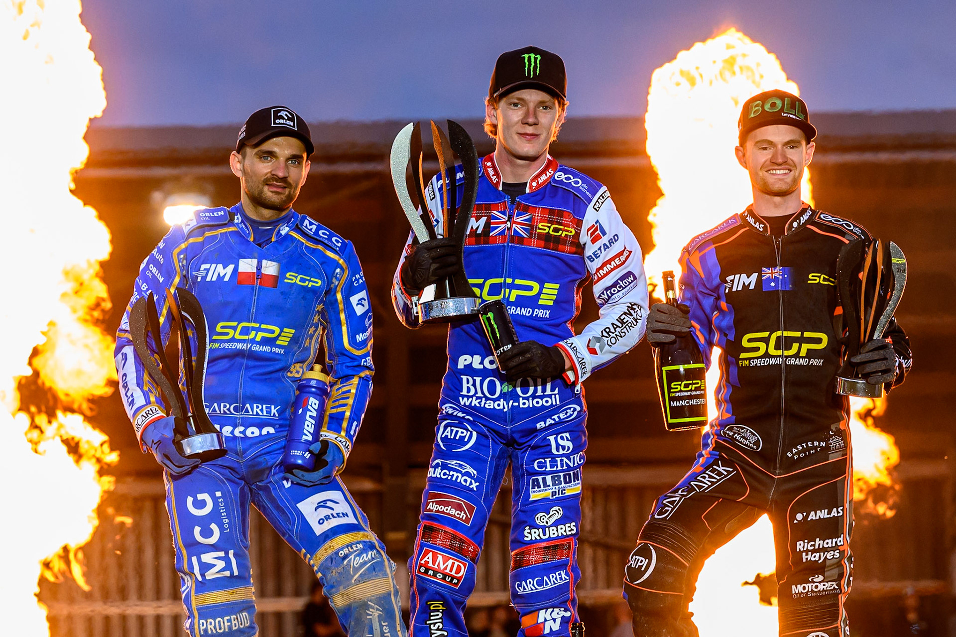 Top3: (L to R) Bartosz Zmarzlik (2nd), Dan Bewley (Winner) Brady Kurtz (3rd) during the ATPI FIM Speedway Grand Prix Round 4 at the National Speedway Stadium, Manchester, on Friday 13th June 2025. (Photo: Ian Charles | MI News)