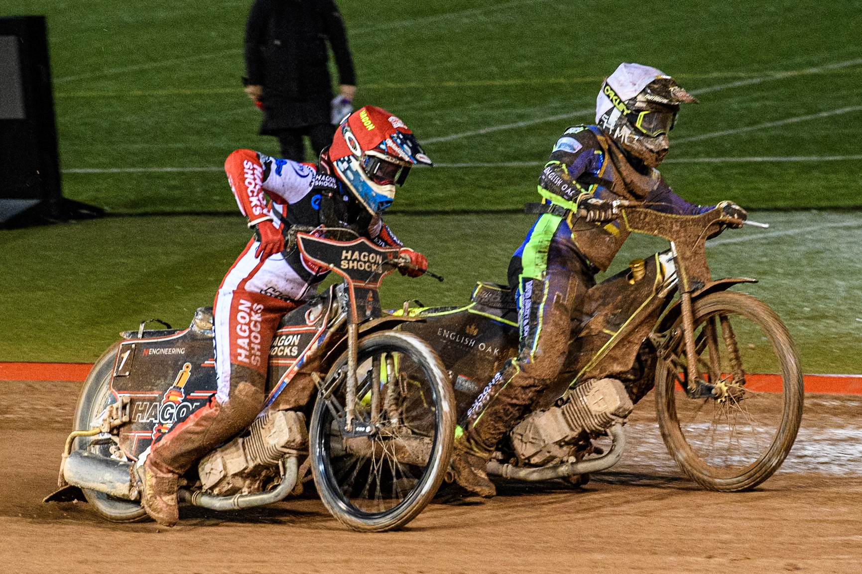 Belle Vue Colts' Sam Hagon in Red rides outside Sheffield Cubs' Nathan Ablitt in White during the WSRA National Development League match between Belle Vue Colts and Sheffield Tiger Cubs at the National Speedway Stadium, Manchester on Monday 7th October 2024. (Photo: Ian Charles | MI News)