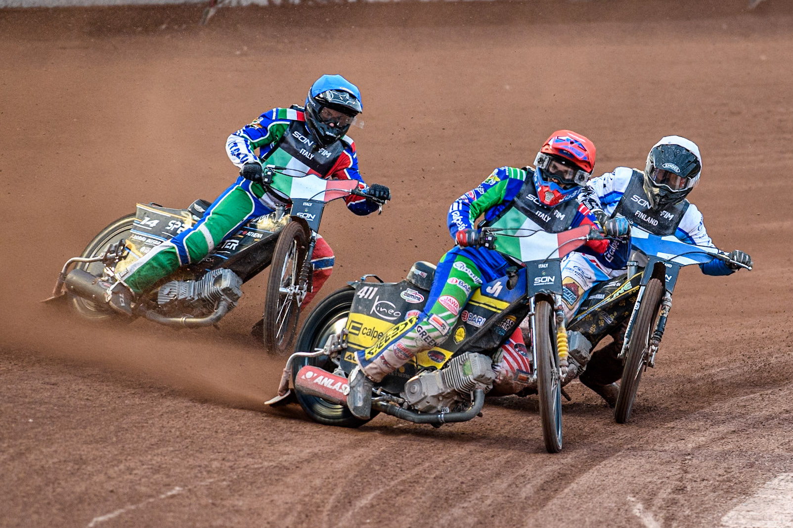 Italy v Finland: Paco Castagna of Italy in Red leading Jesse Mustonen of Finland in White and Nicolas Vicentin of Italy in Blue during the Monster Energy FIM Speedway of Nations Semi-Final 1 at the National Speedway Stadium, Manchester on Tuesday 9th July 2024. (Photo: Ian Charles | MI News)