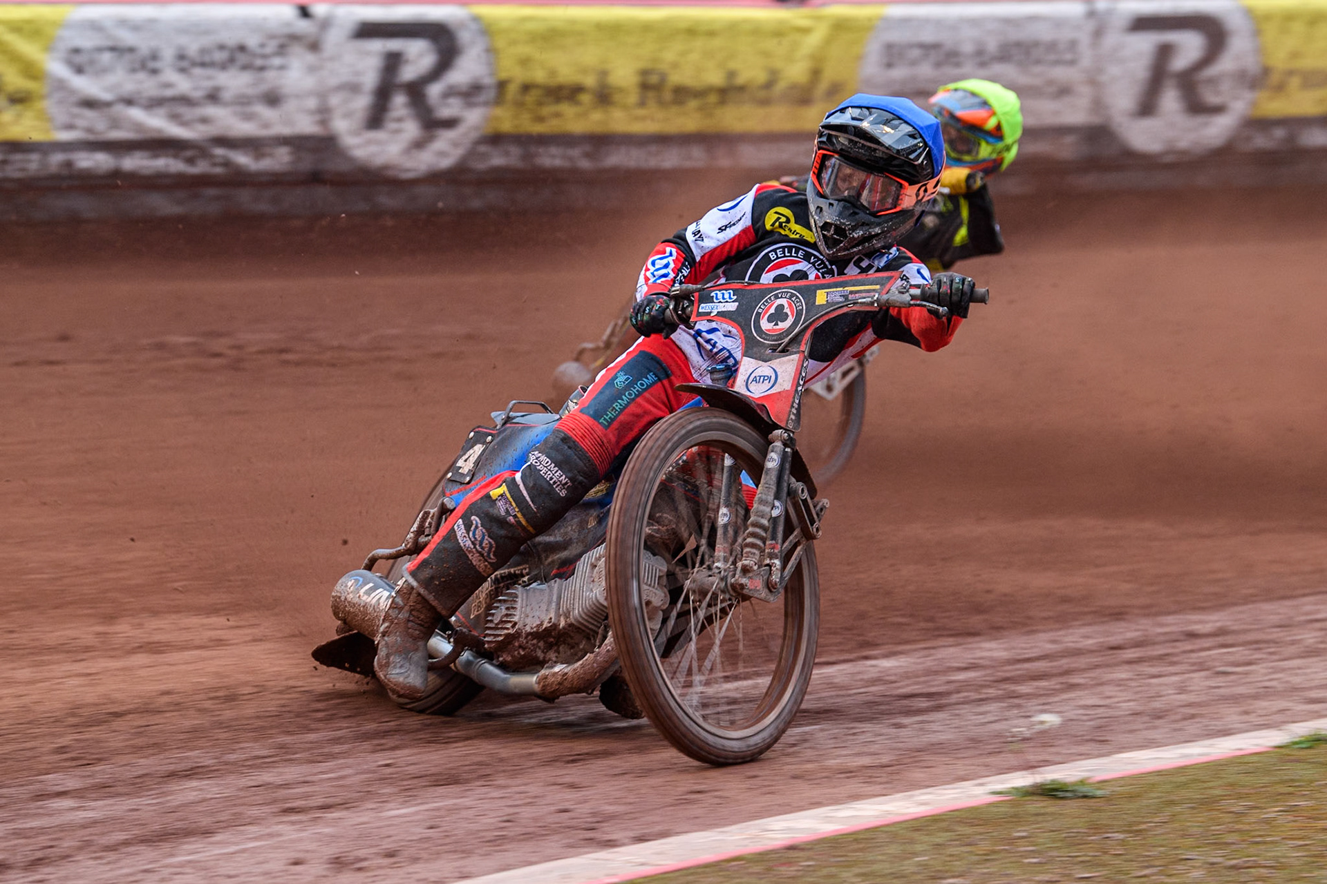 Belle Vue Aces' Ben Cook  in Blue leading Ipswich Witches' Keynan Rew in Yellow during the Rowe Motor Oil Premiership match between Belle Vue Aces and Ipswich Witches at the National Speedway Stadium, Manchester on Monday 1st July 2024. (Photo: Ian Charles | MI News)