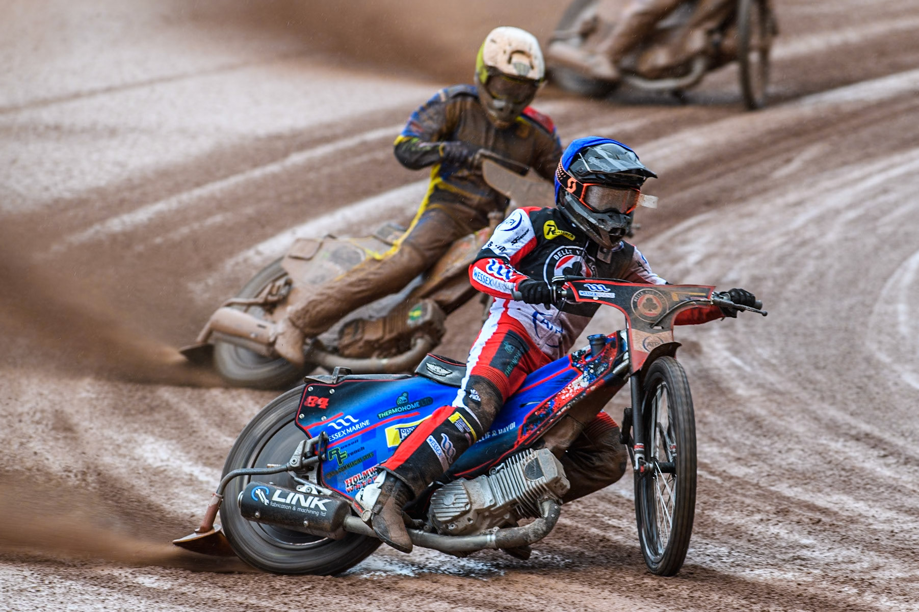 Belle Vue Aces' Ben Cook in Blue leading Chris Holder in White during the Rowe Motor Oil Premiership match between Belle Vue Aces and Sheffield Tigers at the National Speedway Stadium, Manchester on Monday 27th May 2024. (Photo: Ian Charles | MI News)