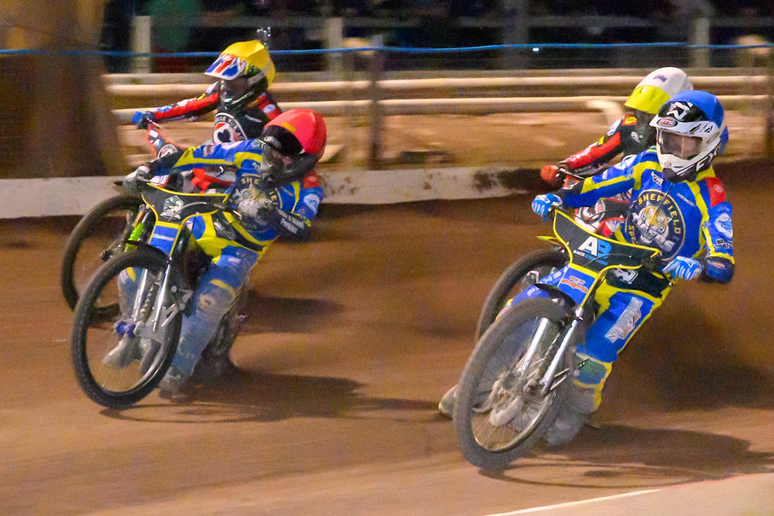 Luke Killeen of Sheffield Tigers in Red and Jye Etheridge of Sheffield Tigers in Blue leading Tate Zischke of Belle Vue Aces in White  and William Cairns of Belle Vue Aces in Yellow during the Rowe Motor Oil Premiership match between Sheffield Tigers and Belle Vue Aces at Owlerton Stadium, Sheffield on Monday 31st August 2026. (Photo: Ian Charles | MI News)