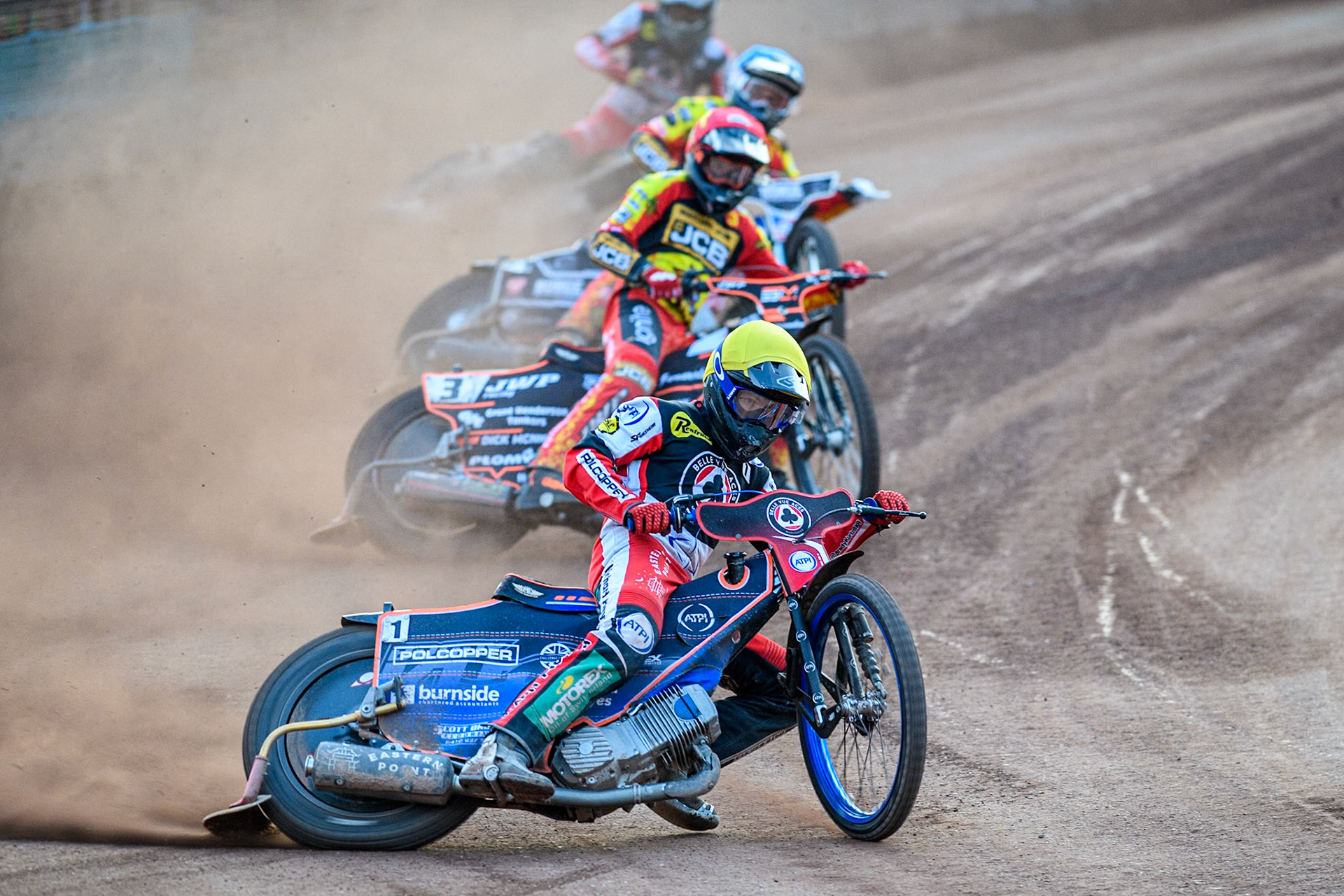 Belle Vue Aces' Brady Kurtz in Yellow leading Leicester Lions' Sam Masters in Red, Leicester Lions' Luke Becker in Blue and Belle Vue Aces' Norick Blodorn in White during the Rowe Motor Oil Premiership match between Leicester Lions and Belle Vue Aces at the Pidcock Motorcycles Arena, Leicester on Thursday 25th July 2024. (Photo: Ian Charles | MI News)