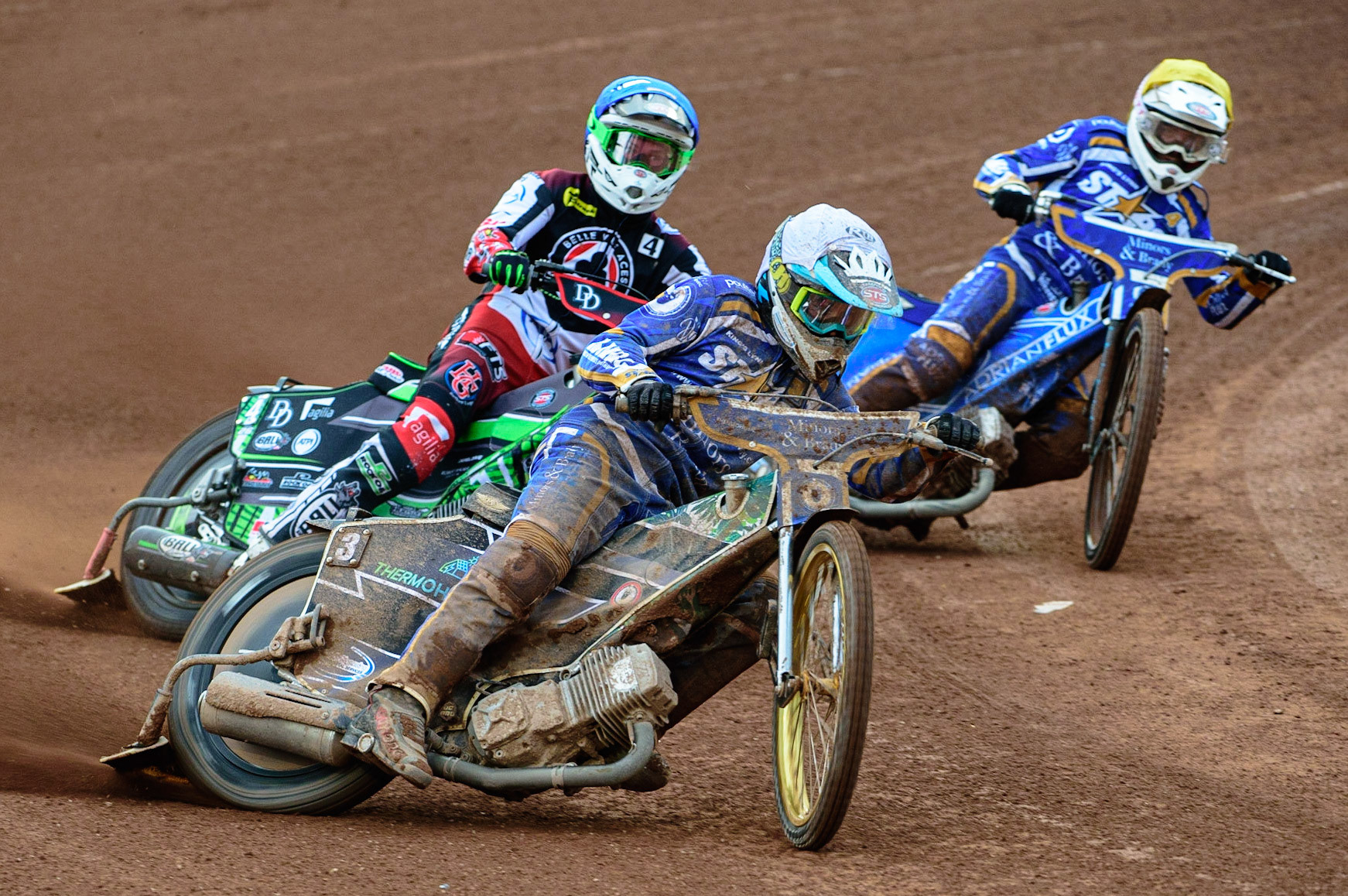 MANCHESTER UK  Richard Lawson  (White) leads Charles Wright  (Blue) and Lewis Kerr  (Yellow) during the SGB Premiership match between Belle Vue Aces and King's Lynn Stars at the National Speedway Stadium, Manchester on Monday 11th July 2022. (Credit: Ian Charles | MI News)