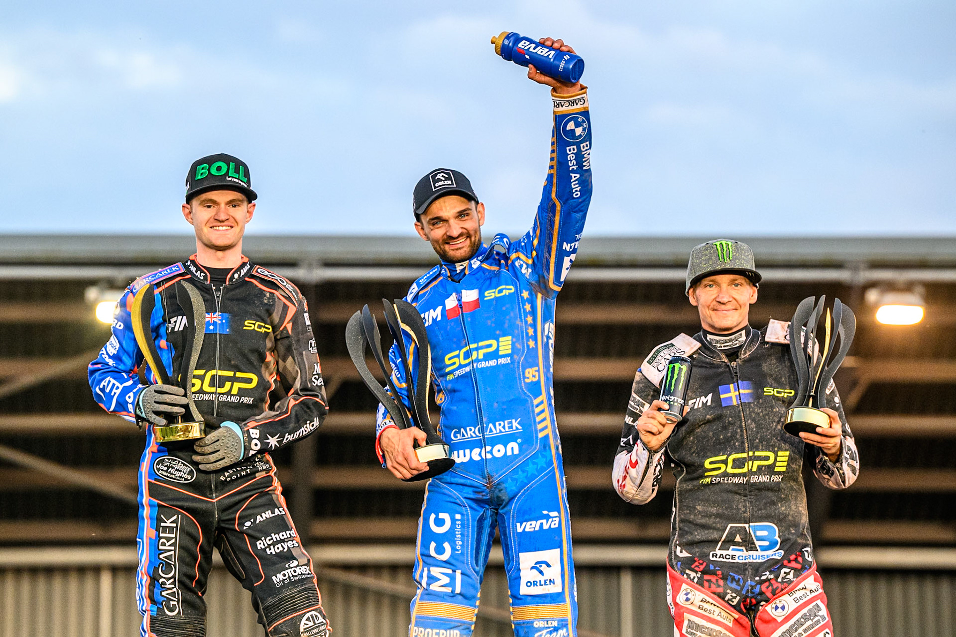 Top3: (L to R) Brady Kurtz (2nd), Bartosz Zmarzlik (First), Fredrik Lindgren (3rd) during the ATPI FIM Speedway Grand Prix Round 5 at the National Speedway Stadium, Manchester, on Saturday 14th June 2025. (Photo: Ian Charles | MI News)
