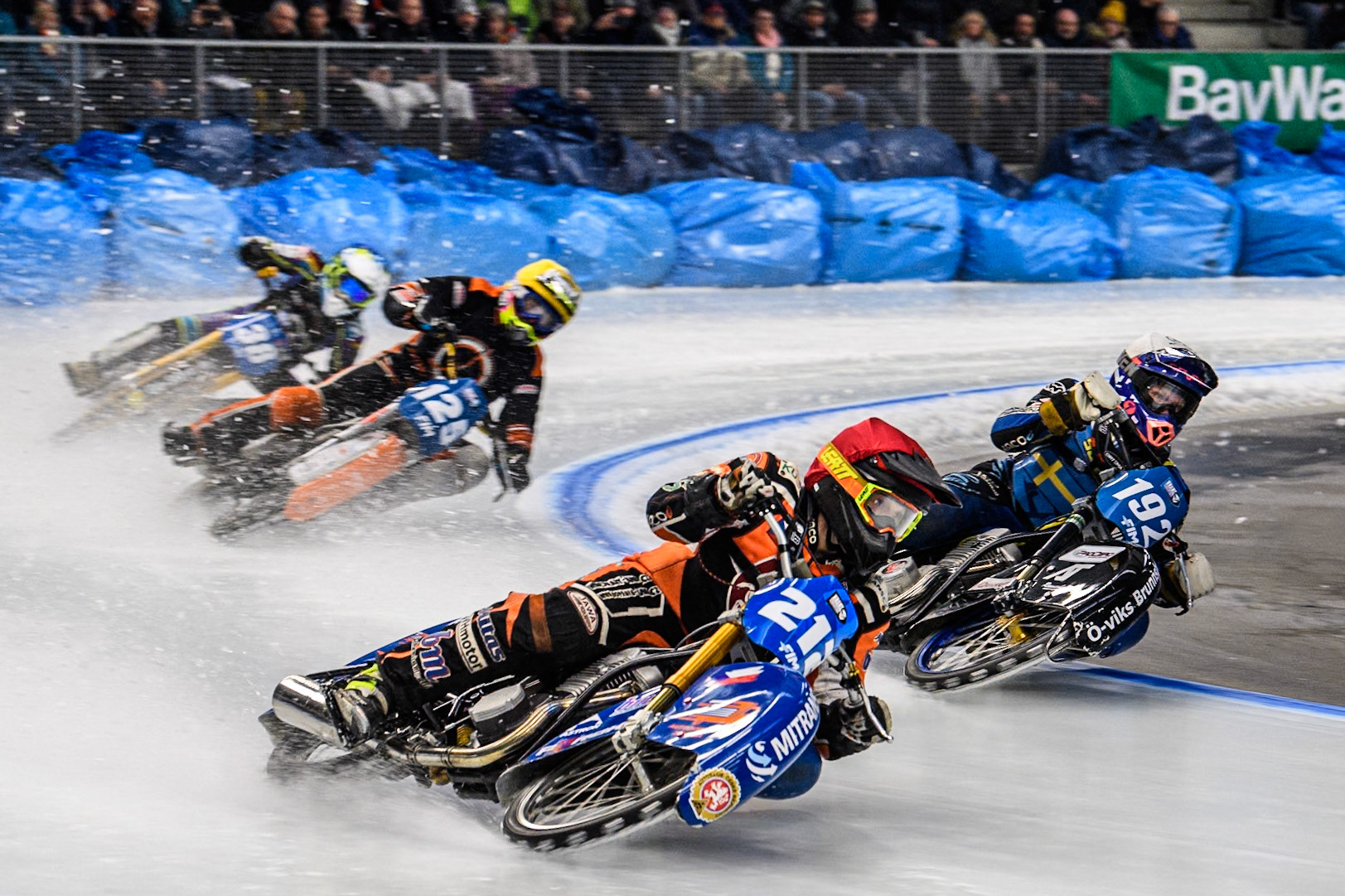 Lukas Hutla (212) of the Czech Republic in Red leading Niclas Svensson (192) of Sweden in White Sebastian Reitsma (125) of The Netherlands in Yellow and Maximilian Niedermaier (38) of Germany in Blue during the Ice Speedway Gladiators World Championship Final 2 at Max-Aicher-Arena, Inzell on Sunday 16th March 2025. (Photo: Ian Charles | MI News)