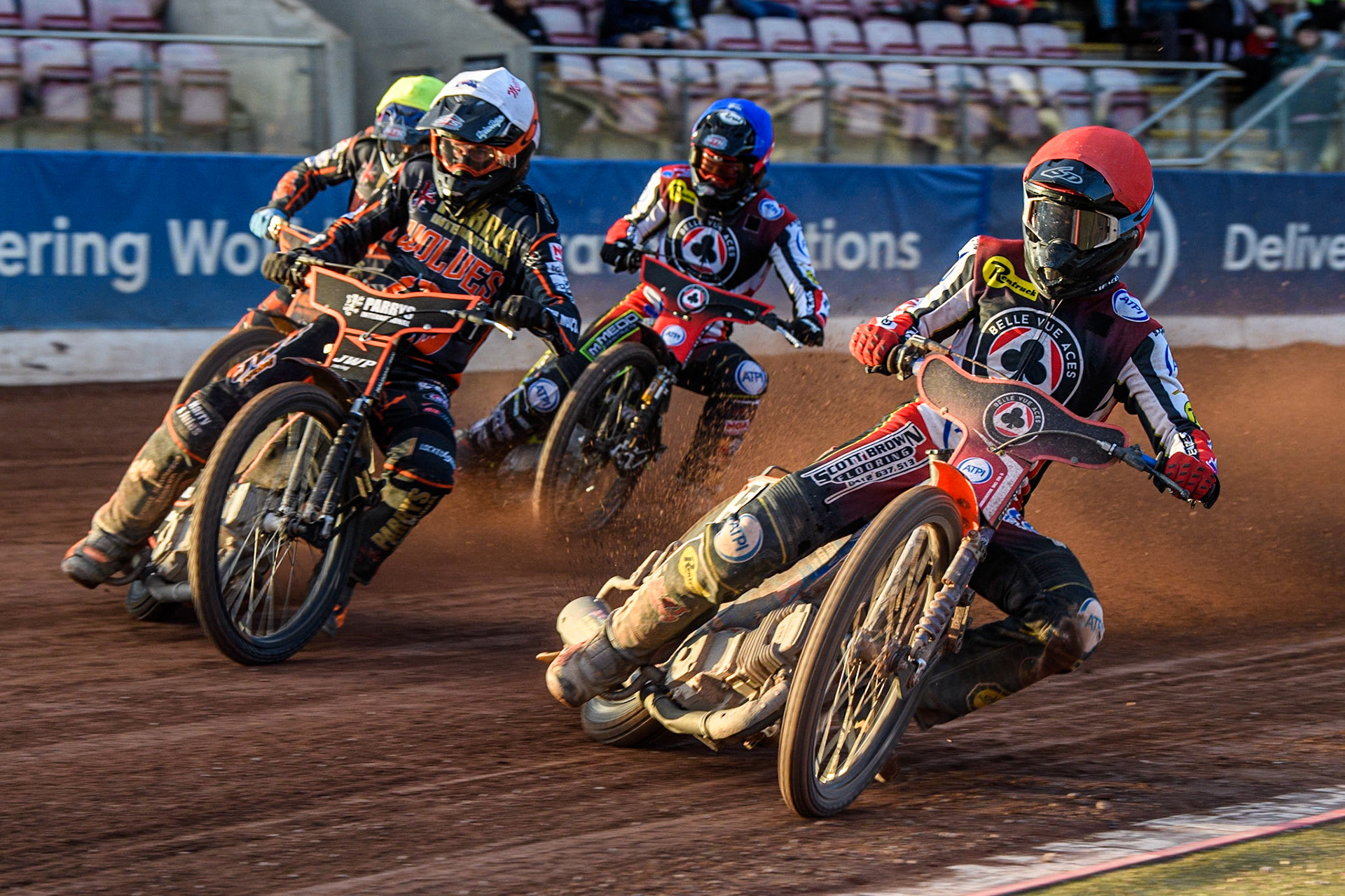Jaimon Lidsey (Red) leads Ryan Douglas (White) Rory Schlein (Yellow) and Charles Wright (Blue) during the Sports Insure Premiership match between Belle Vue Aces and Wolverhampton Wolves at the National Speedway Stadium, Manchester on Monday 3rd July 2023. (Photo: Ian Charles | MI News)