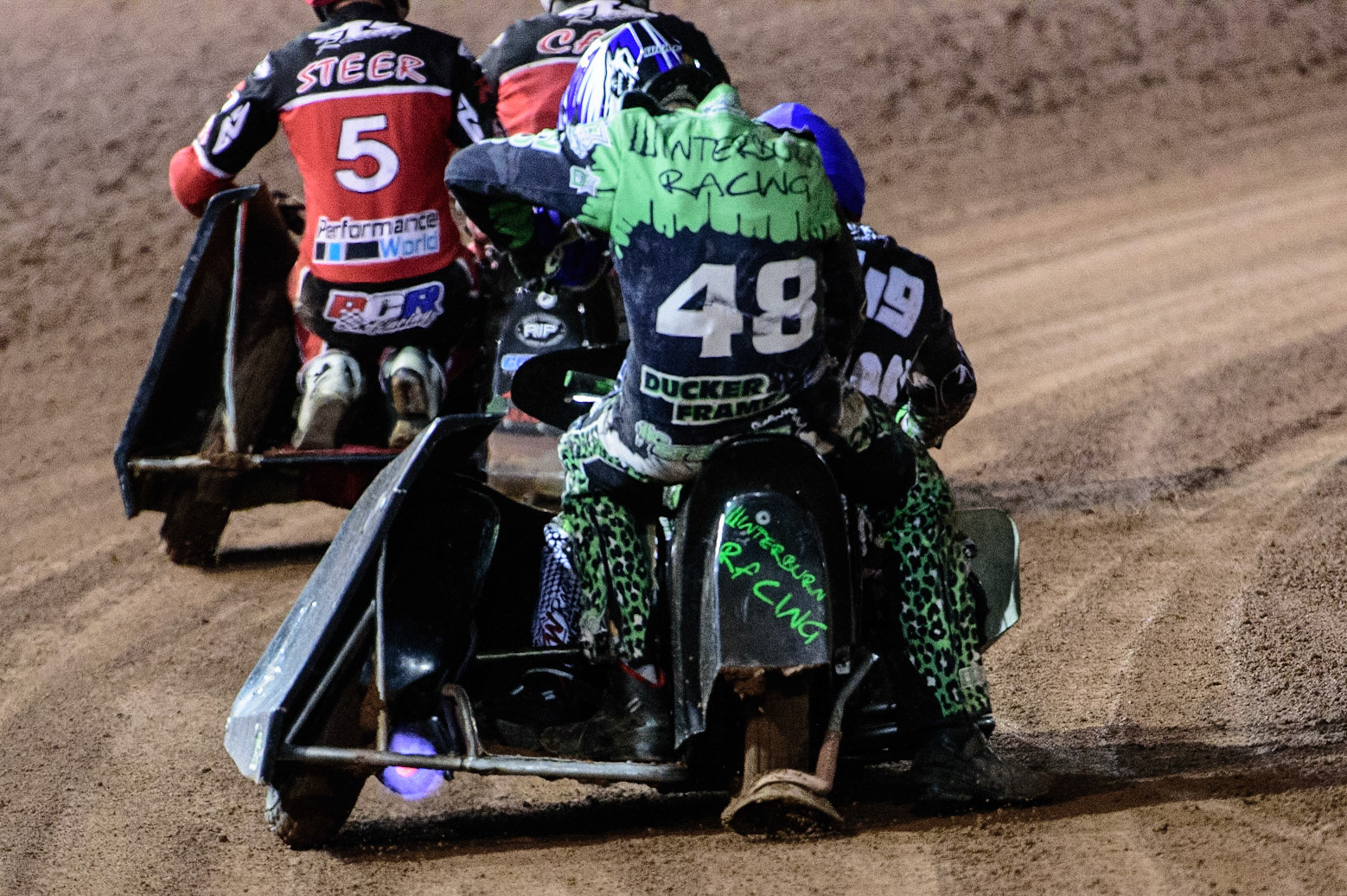 MANCHESTER, UK. OCT 30TH   After the race, Gareth Winterburn &amp; Bradley Atkinson’s machine backfires during the Manchester Masters Sidecar Speedway and Flat Track Racing at the National Speedway Stadium, Manchester on Saturday 30th October 2021. (Credit: Ian Charles | MI News)