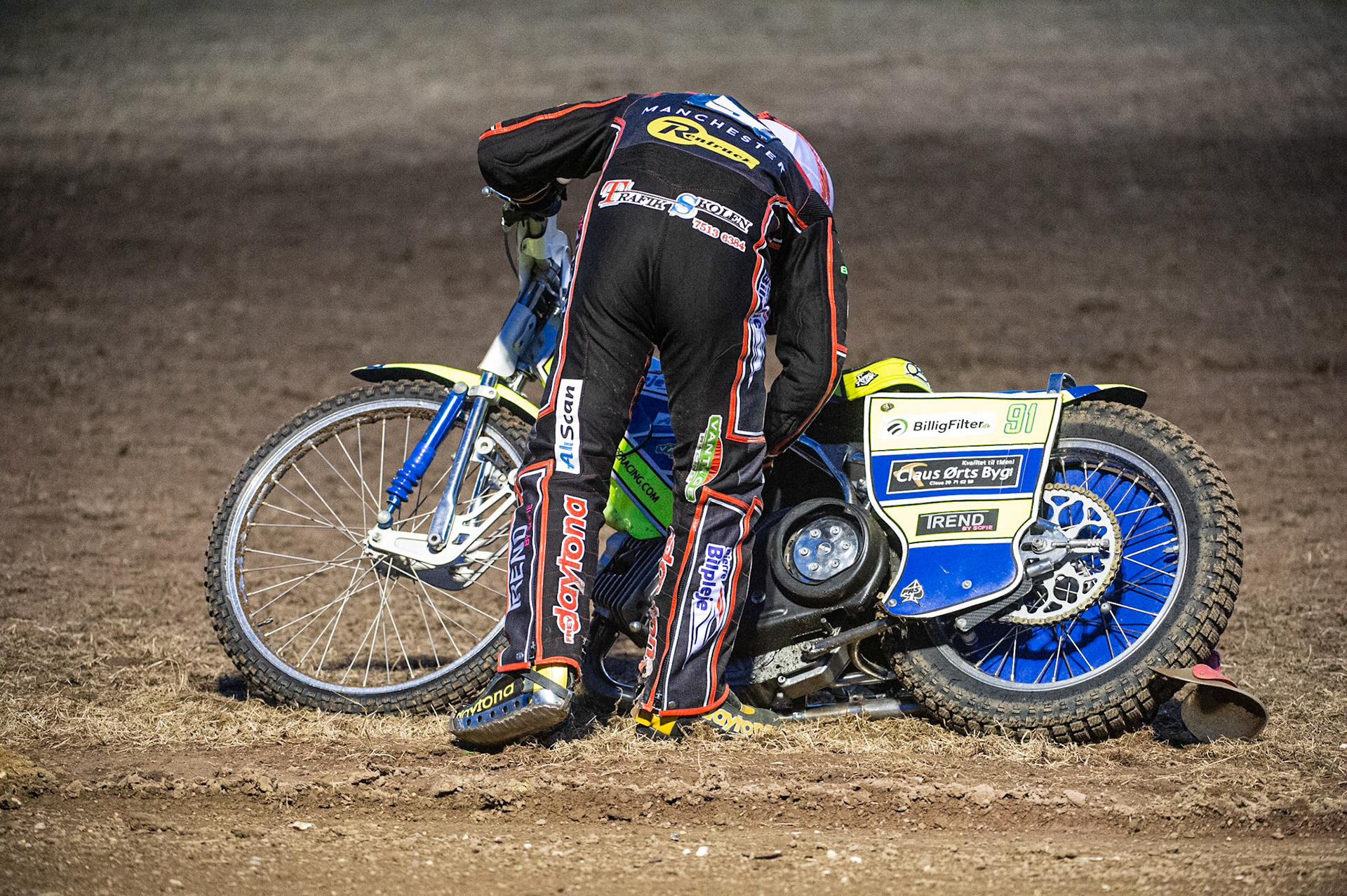 Photo by Ian Charles:

Kenneth Bjerre  checks his bike after his breakdown

Peterborough Panthers v Belle Vue Aces, British Speedway Premiership, Thursday, 5, September, 2019