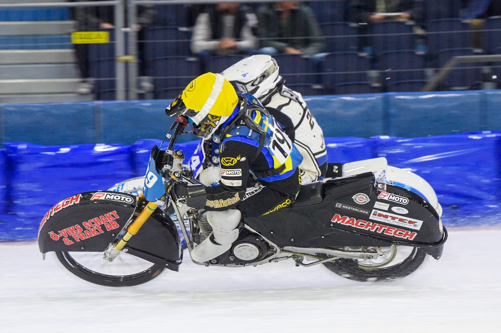 Martin Haarahiltunen (199) of Sweden in Yellow rides inside Max Koivula (24) of Finland in White during the FIM Ice Speedway Gladiators World Championship, Final 3 at the Ice Stadium, Thialf, Heerenveen on Saturday 5th April 2025. (Photo: Ian Charles | MI News)