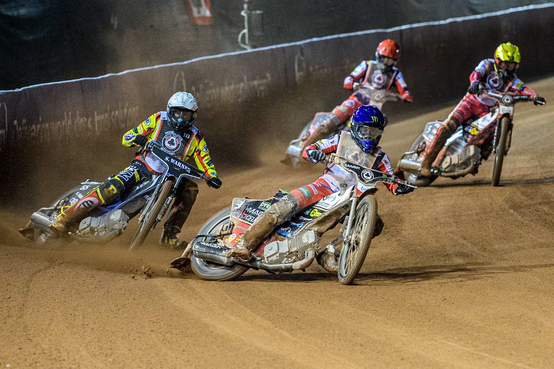 Jaimon Lidsey in Blue leading Matej Zagar in White, Dan Bewley in Yellow and Tate Zischke in Red during the Peter Craven Memorial Trophy at the National Speedway Stadium, Manchester on Monday 17th March 2025. (Photo: Ian Charles | MI News)