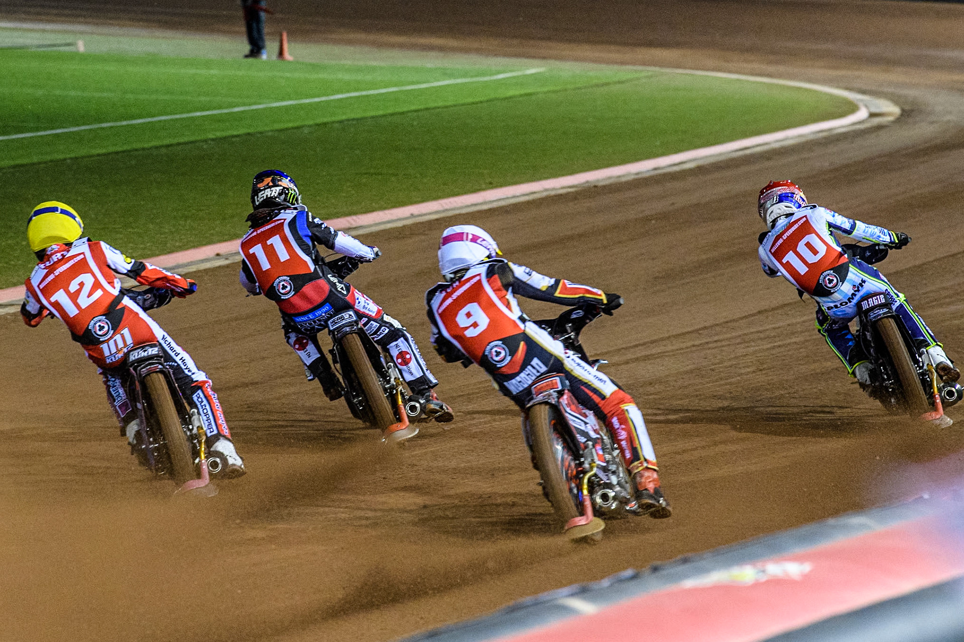 Poland's Patryk Wojdylo (White) chases Australia's Brady Kurtz (Yellow) Sweden’s Fredrik Lindgren (Blue) and Poland’s Maceij Janowski (Red) during the Peter Craven Memorial Trophy meeting at the National Speedway Stadium, Manchester on Monday 18th March 2024. (Photo: Ian Charles | MI News)