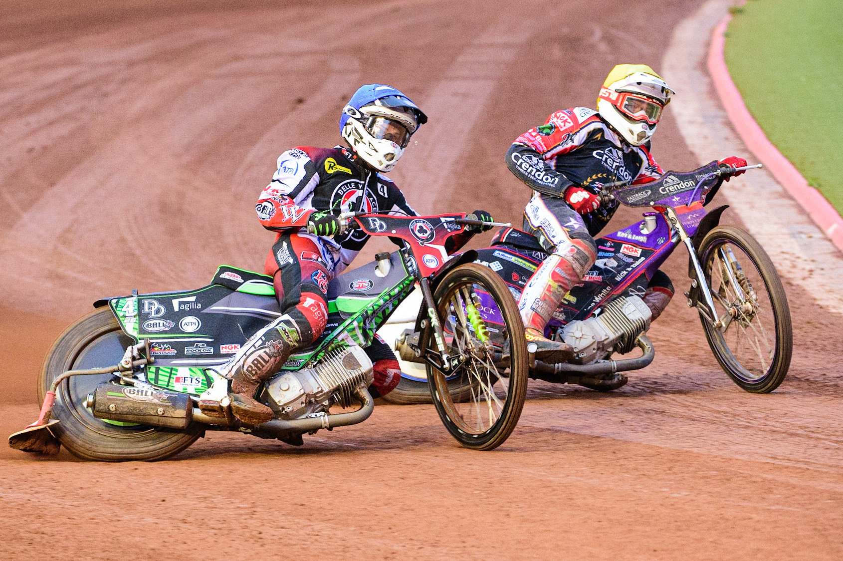 Charles Wright (Blue) outside Ulrich Oostergaard  (Yellow) during the SGB Premiership match between Belle Vue Aces and Peterborough at the National Speedway Stadium, Manchester on Monday 25th July 2022. (Credit: Ian Charles | MI News