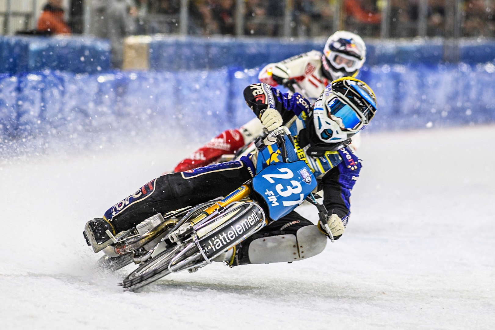 Jimmy Hörnell (237) of Sweden in Yellow leading Franky Zorn (100) of Austria in White during the FIM Ice Speedway Gladiators World Championship, Final 3 at the Ice Stadium, Thialf, Heerenveen on Saturday 5th April 2025. (Photo: Ian Charles | MI News)
