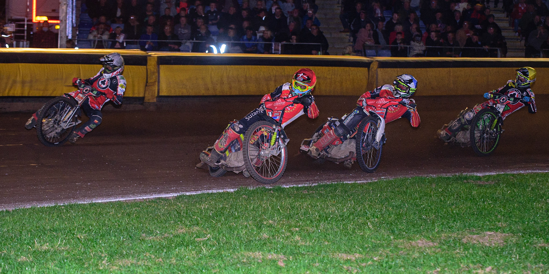 PETERBOROUGH, UK. OCT 14TH Michael Palm Toft  (Red) leads Chris Harris  (Blue) and Charles Wright  (Yellow) with Dan Bewley  (White) going wide during the SGB Premiership Grand Final 2nd leg between Peterborough and Belle Vue Aces at East of England Showground, Peterborough on Thursday 14th October 2021. (Credit: Ian Charles | MI News)