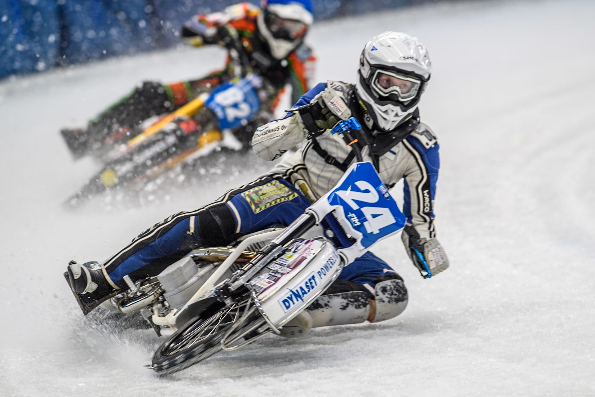 Finland's Max Koivula (24)  (White) leads  Germany's Markus Jell (82) (Blue) during the FIM Ice Speedway Gladiators World Championship Final 2 at the Max-Aicher-Arena, Inzell on Sunday 24 March 2024. (Photo: Ian Charles | MI News)