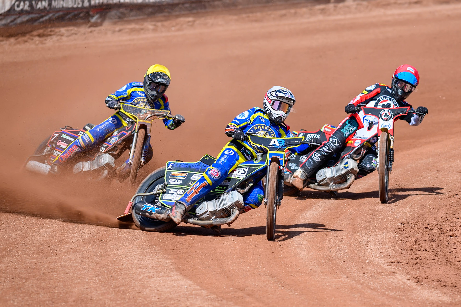 Jye Etheridge of Sheffield Tigers in White leading Luke Killeen of Sheffield Tigers  in Yellow and Tate Zischke of Belle Vue Aces  in Red during the Rowe Motor Oil Premiership match between Belle Vue Aces and Sheffield Tigers at the National Speedway Stadium, Manchester on Monday 25th May 2026. (Photo: Ian Charles | MI News)