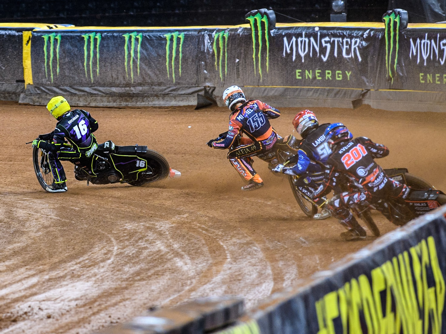 January Kvech (201) of Czechia in Blue chases Robert Lambert (505) of Great Britain in Red, Mikkel Michelsen (155) of Denmark in White and Tom Brennan (16) Wild card rider of Great Britain in Yellow during the FIM Speedway Grand Prix of Great Britain at The Principality Stadium, Cardiff on Saturday 17th August 2024. (Photo: Ian Charles | MI News)