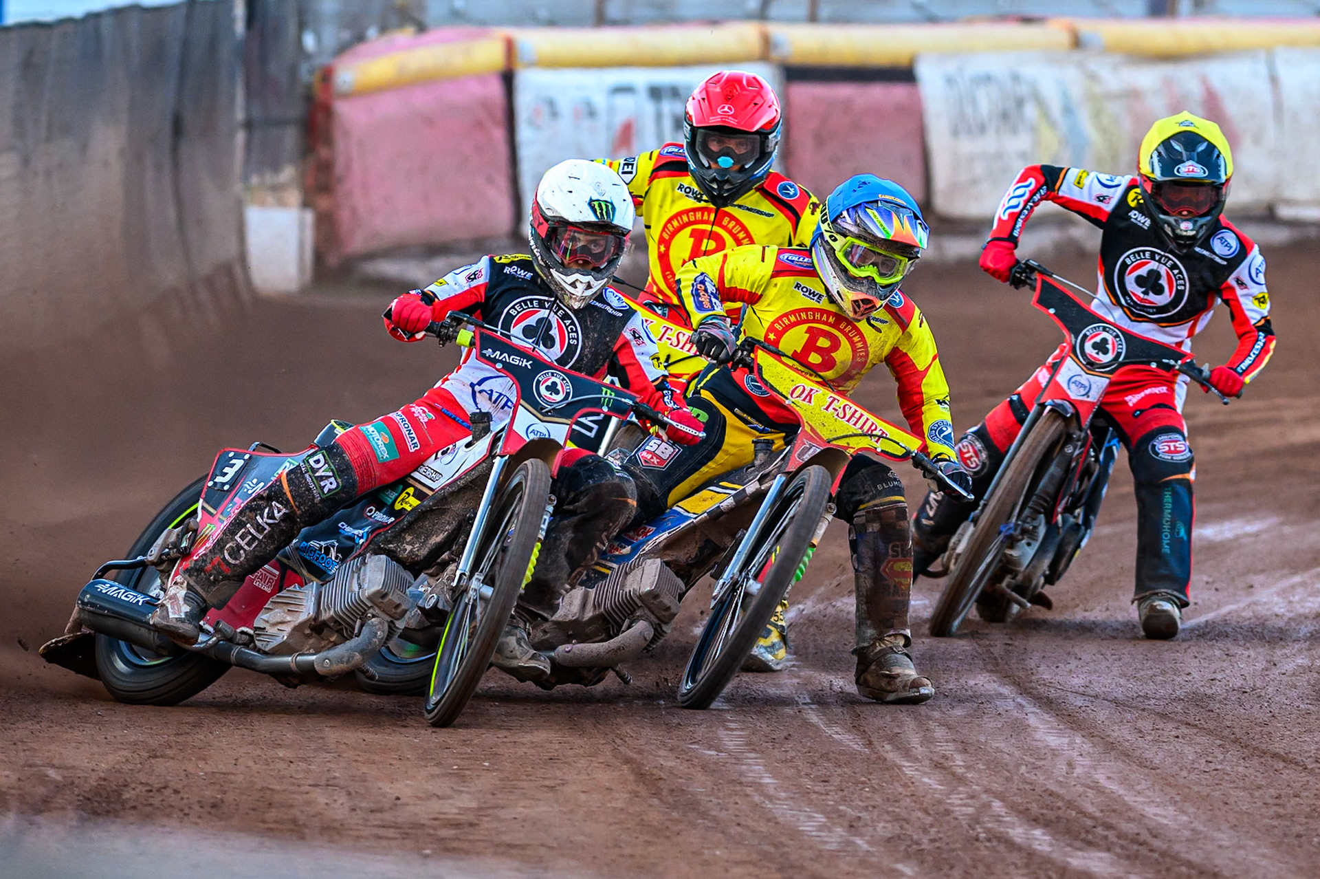 Belle Vue Aces' Jaimon Lidsey  in White leading Birmingham Brummies' Ben Barker  in Blue, Birmingham Brummies' Matej Zagar  in Red and Belle Vue Aces' Zach Cook  in Yellow during the Rowe Motor Oil Premiership match between Birmingham Brummies and Belle Vue Aces at Perry Barr Stadium, Birmingham on Monday 28th July 2025. (Photo: Ian Charles | MI News)