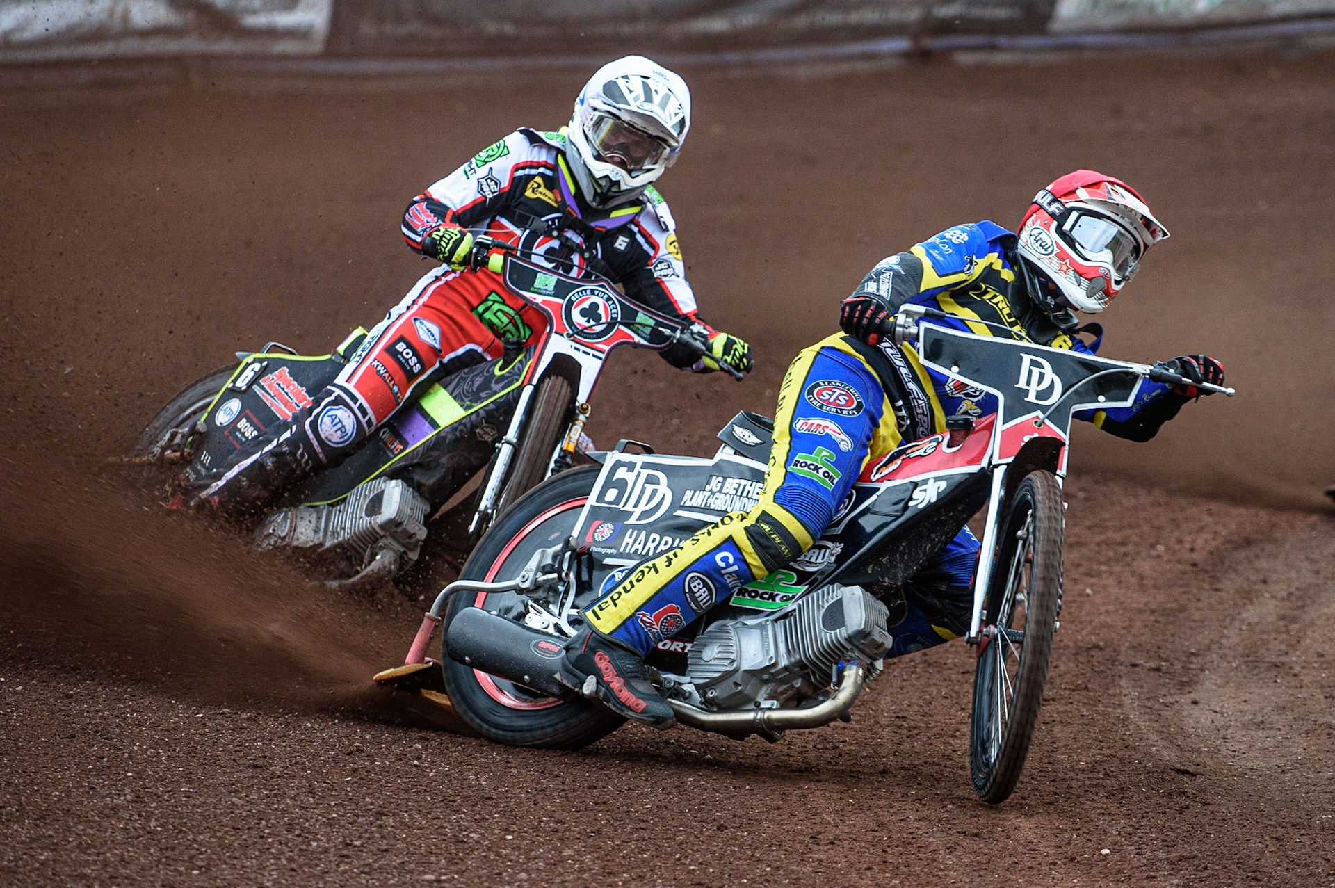 SHEFFIELD, UK. JULY 1ST     James Wright (Red) leads Tom Brennan (White) during the SGB Premiership match between Sheffield Tigers and Belle Vue Aces at Owlerton Stadium, Sheffield on Thursday 1st July 2021. (Credit: Ian Charles | MI News)