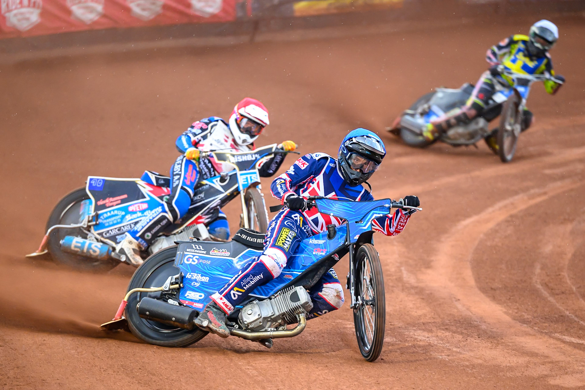 Frederik Jacobsen of Denmark in Blue leading Frederik Jacobsen of Denmark in Red and Casper Henriksson of Sweden in White  during the Speedway GP Qualifying Round 3 at Allied Ashfield Stadium, Glasgow on Saturday 30th May 2026. (Photo: Ian Charles | MI News)