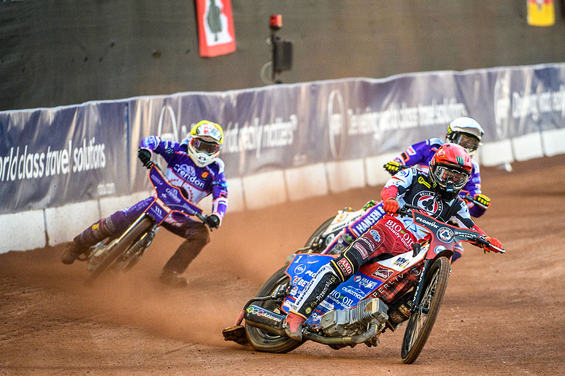 Dan Bewley  (Red) leads Niels-Kristian Iversen  (White) and Ben Cook  (Yellow) during the SGB Premiership match between Belle Vue Aces and Peterborough at the National Speedway Stadium, Manchester on Monday 24th April 2023. (Photo: Ian Charles | MI News)