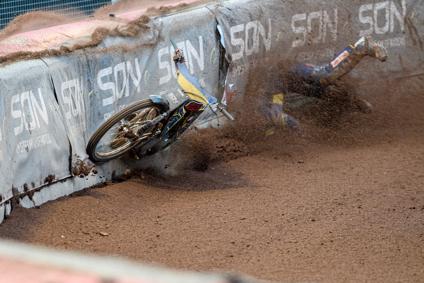 Marko Levishyn of Ukraine in Yellow crashes out of his final heat during the Monster Energy FIM Speedway of Nations Semi-Final 1 at the National Speedway Stadium, Manchester on Tuesday 9th July 2024. (Photo: Ian Charles | MI News)
