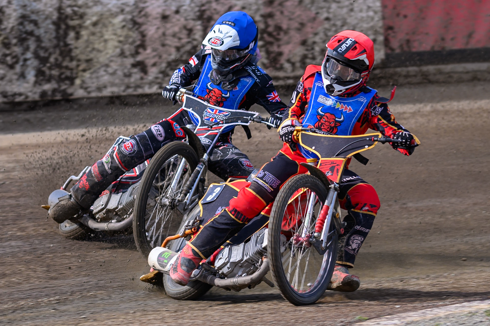 Luke Harris of Buxton Bulls in Red  and Jack Shimelt of Buxton Bulls in Blue  go for maximum heat points during the WSRA National Development League match  between Buxton Bulls and Middlesborough Tigers at Hi-Edge Speedway, Buxton on Sunday 16th August 2026. (Photo: Ian Charles | MI News)