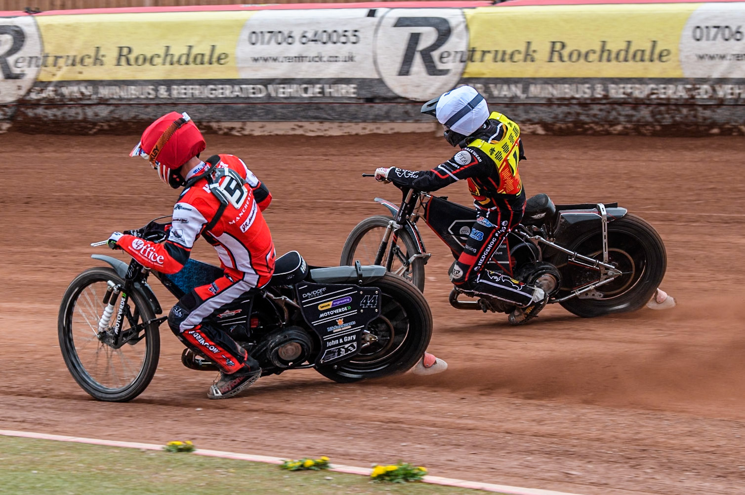 Belle Vue Colts' Freddy Hodder in Red rides inside Leicester Lion Cubs' Guest Rider Ben Morley in White during the WSRA National Development League match between Belle Vue Colts and Leicester Lion Cubs at the National Speedway Stadium, Manchester on Friday 18th April 2025. (Photo: Ian Charles | MI News)