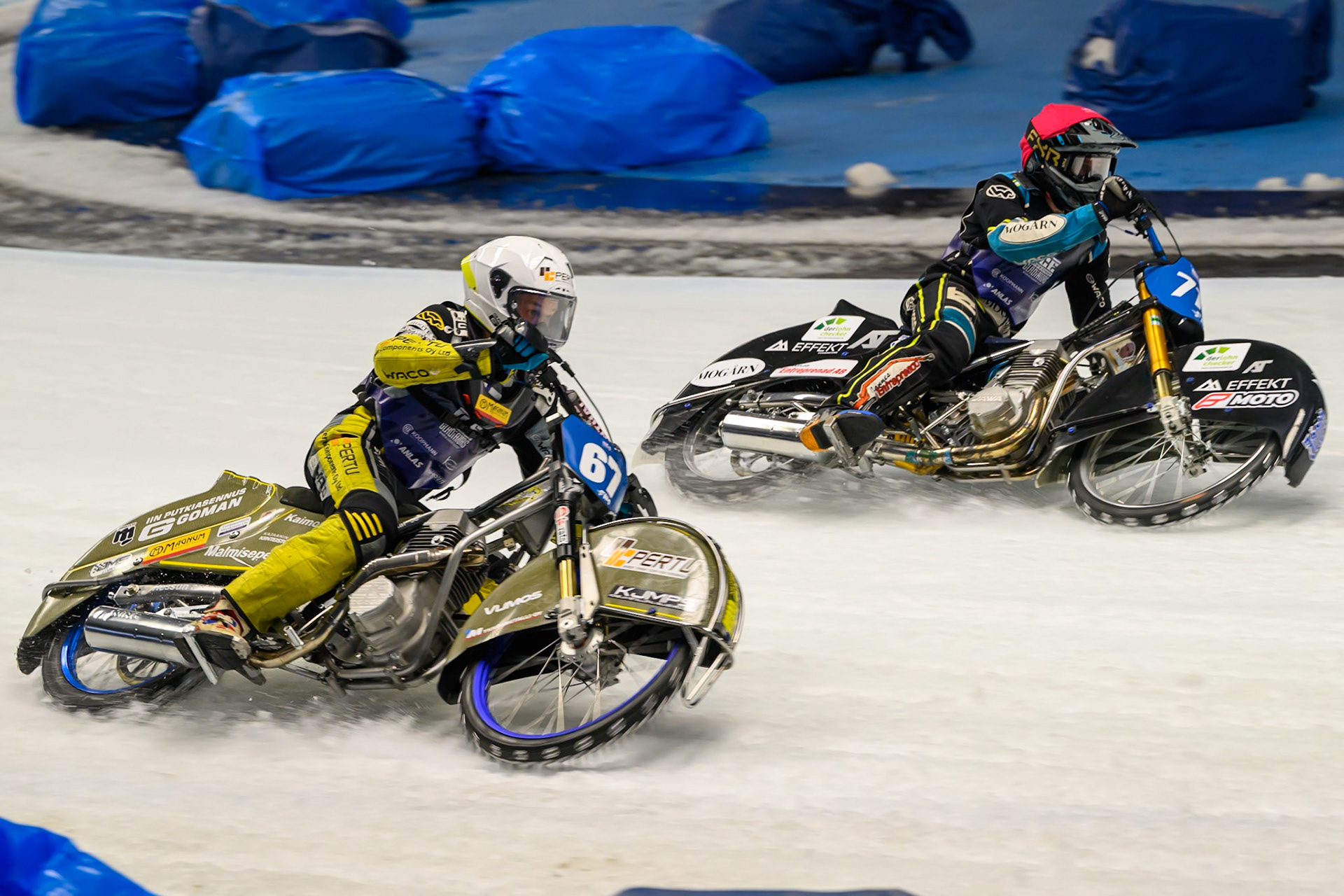 Heikki Huusko (67) of Finland in White rides outside Filip Jäger (719) of Sweden in Red during the Ice Speedway Gladiators World Championship Final 2 at Max-Aicher-Arena, Inzell on Sunday 15th March 2026. (Photo: Ian Charles | MI News)