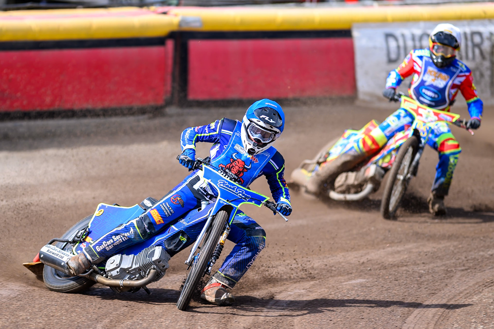 Arran Butcher of Buxton Bulls in Blue leading Simon Lambert of Kings Lynn Young Stars in White during the WSRA National Development League match between Buxton Bulls and King's Lynn Young Stars at Hi-Edge Speedway, Buxton on Sunday 9th August 2026. (Photo: Ian Charles | MI News)